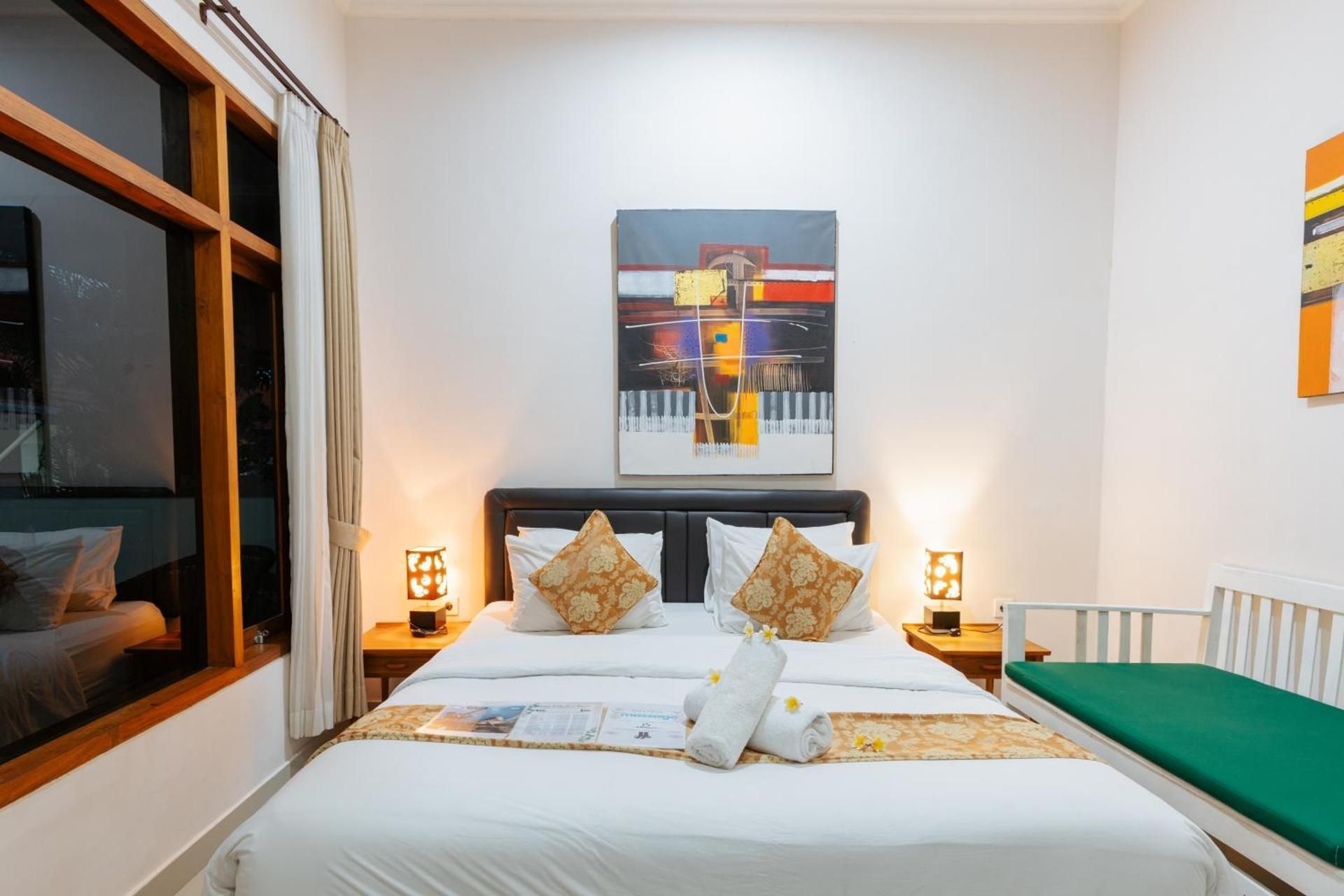 Deluxe Double Room with Balcony and Garden View