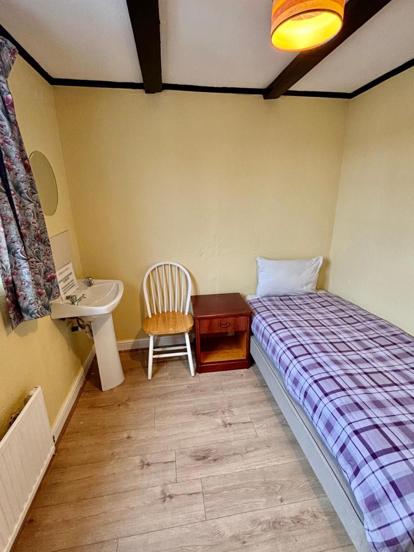 Single Room with Shared Bathroom