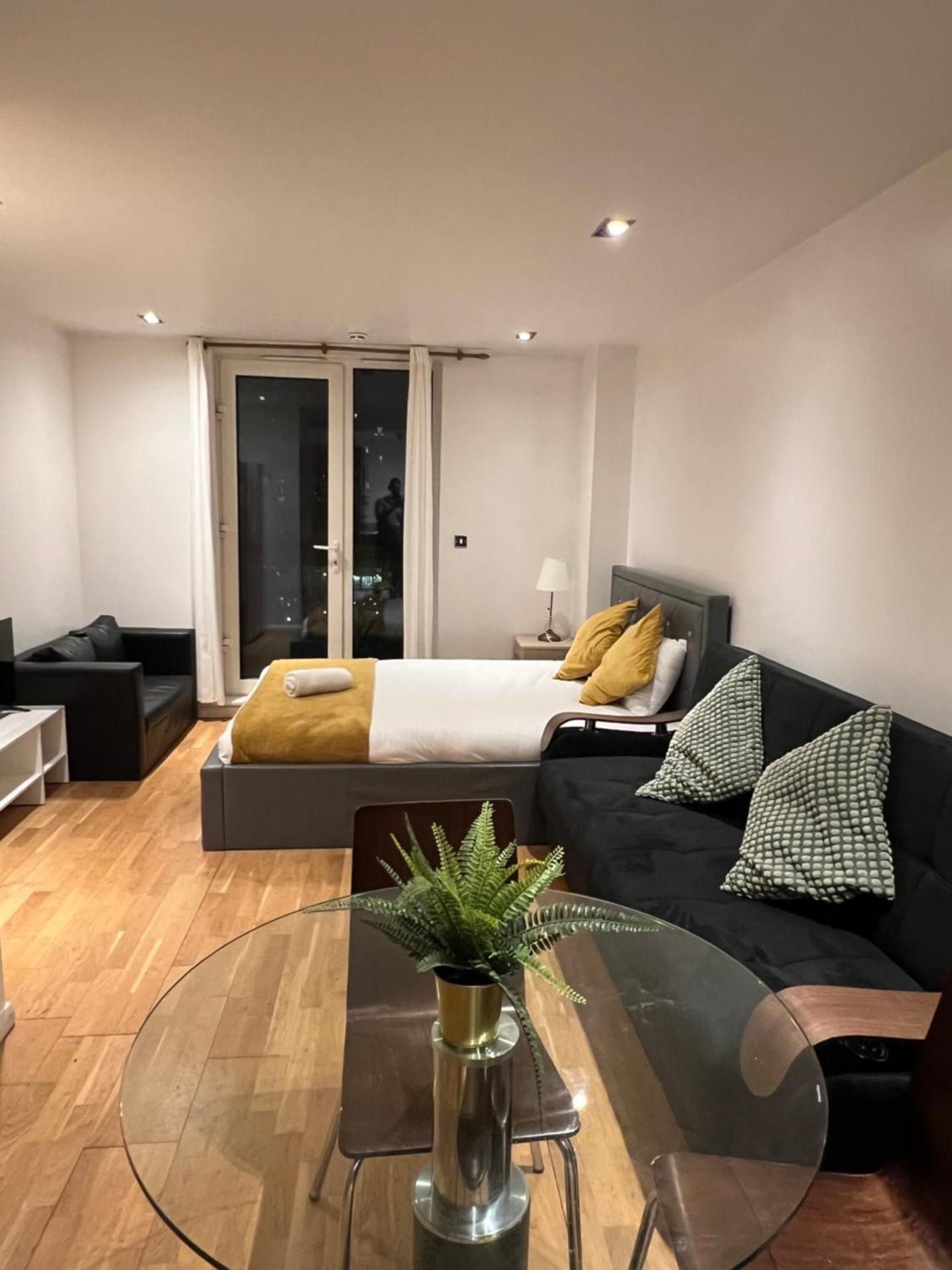 One-Bedroom Apartment with Balcony and City View