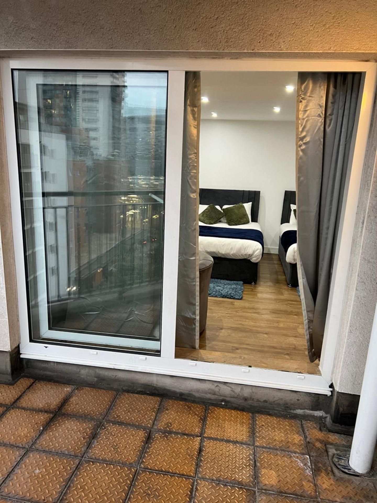 Two-Bedroom Apartment with Balcony