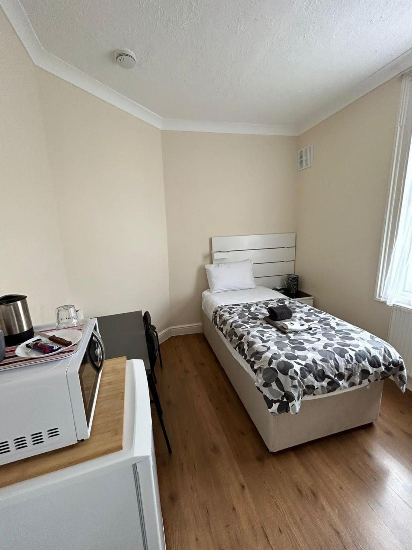 Single Room with Shared Shower and Toilet