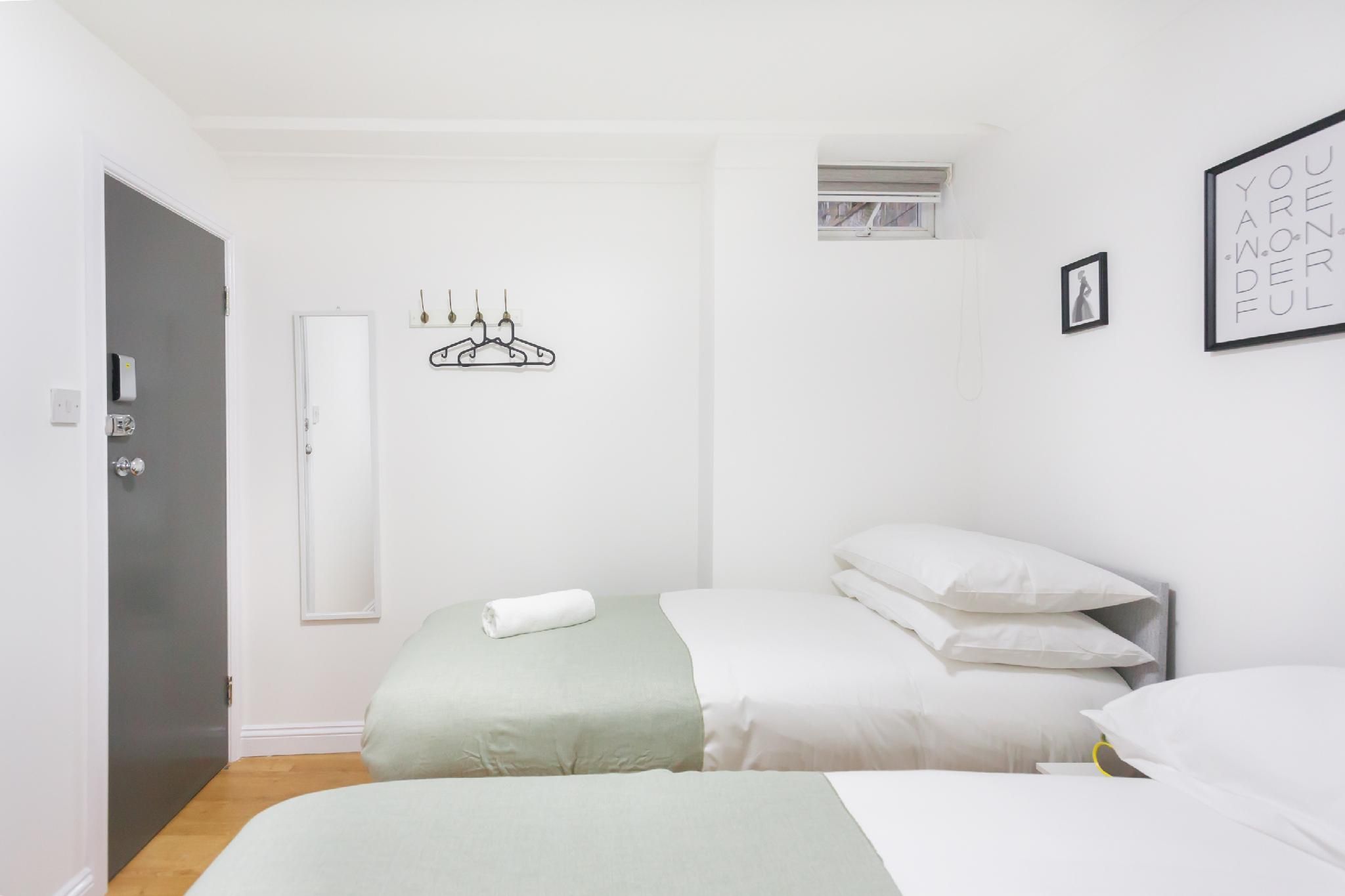 Twin Room - Shared Bathroom