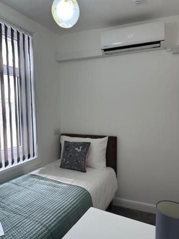 Single Room with Shared Bathroom