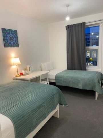 Triple Room with Shared Bathroom