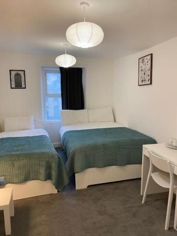 Triple Room with Shared Bathroom