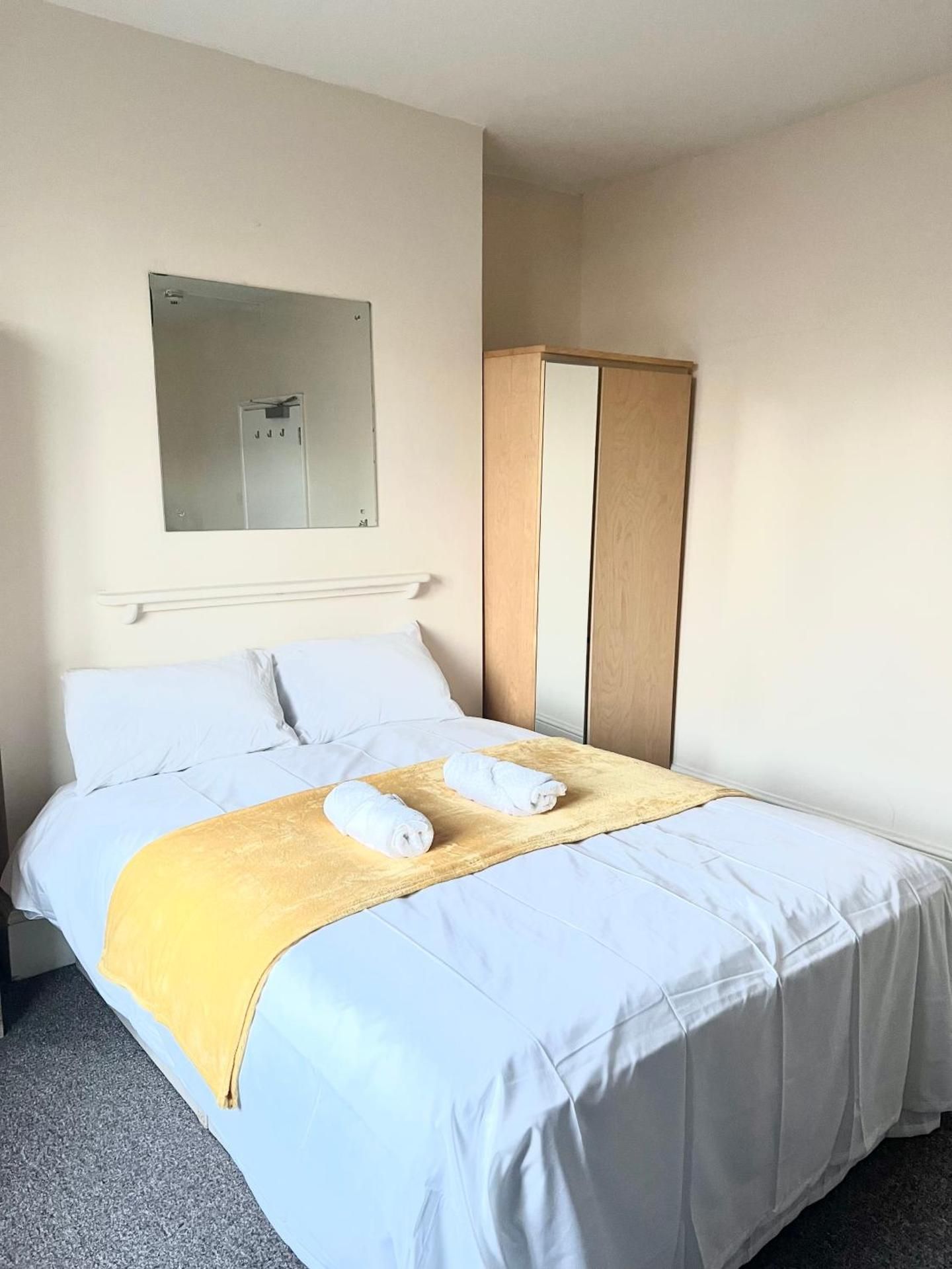 Queen Room with Shared Bathroom