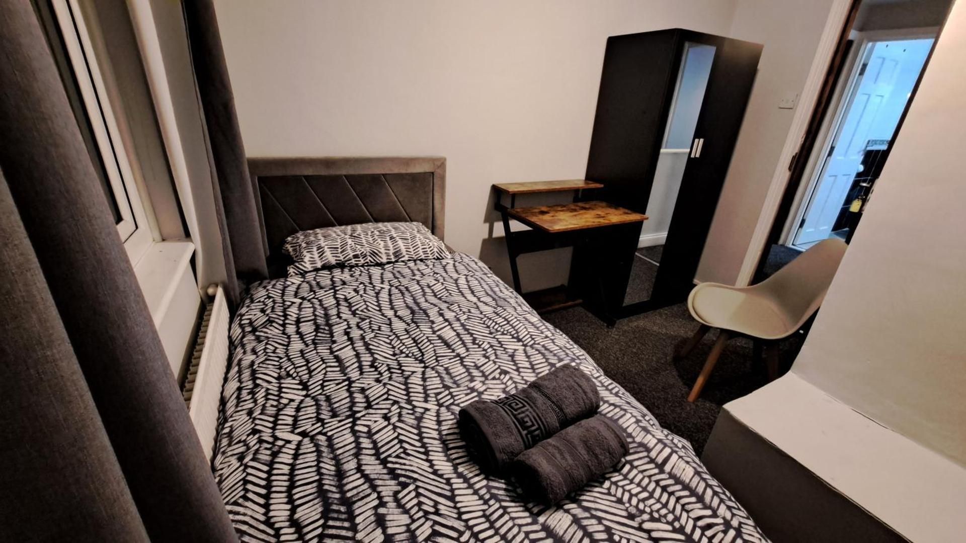 Single Room with Shared Bathroom