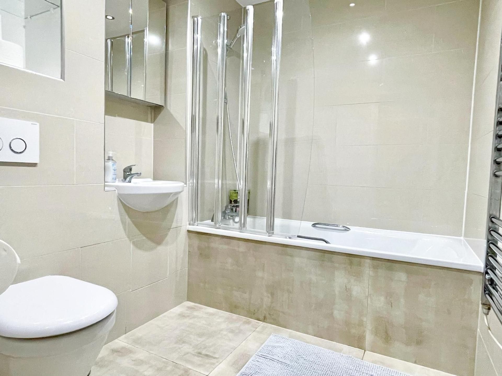 Three-Bedroom Apartment with Balcony
