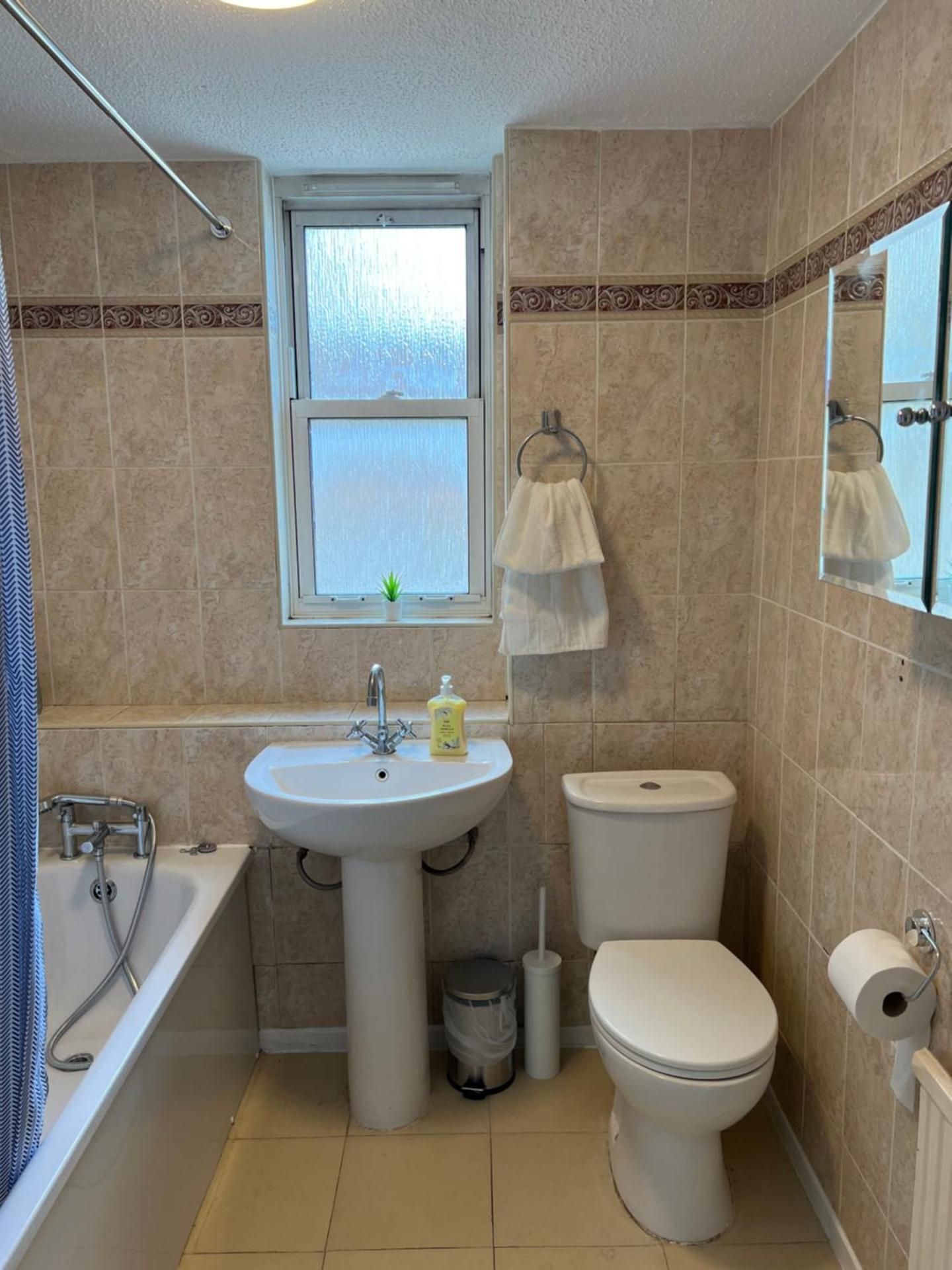 Two-Bedroom Apartment with Balcony