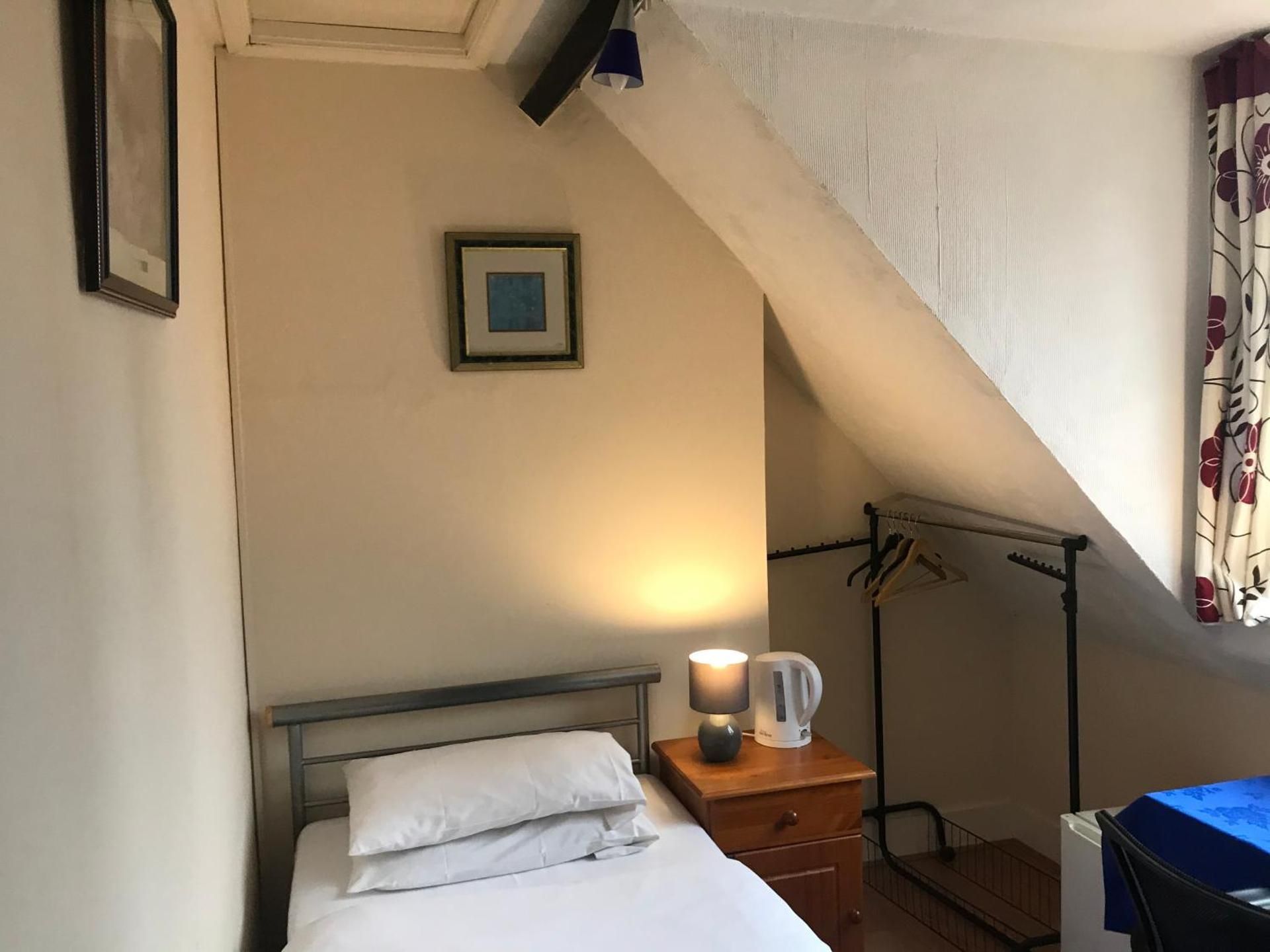 Single Room with Shared Shower and Toilet