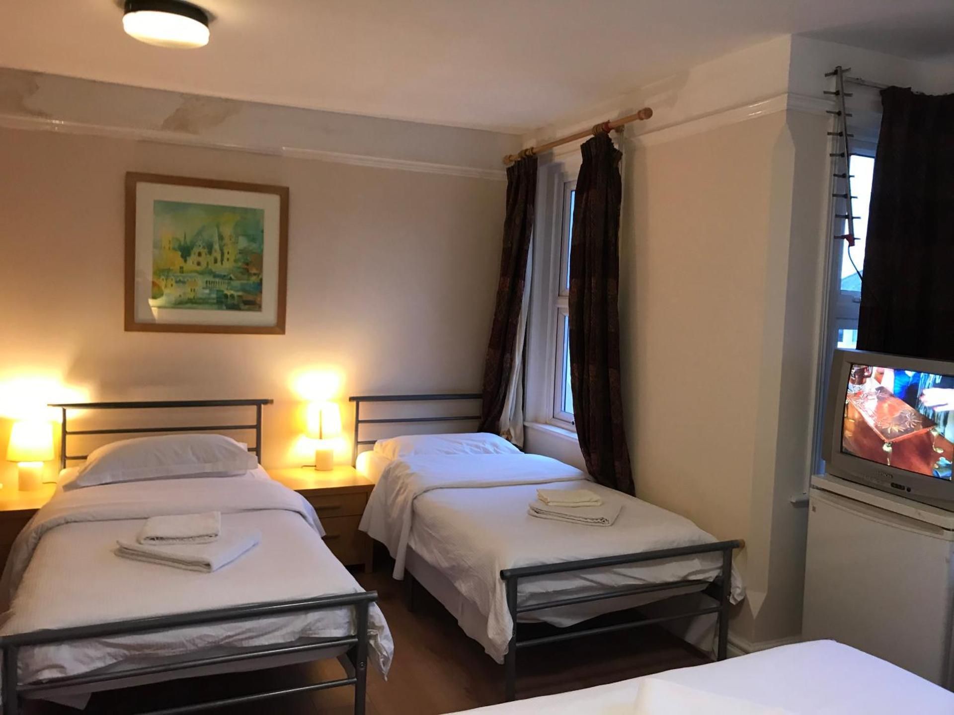 Quadruple Room with Shared Bathroom
