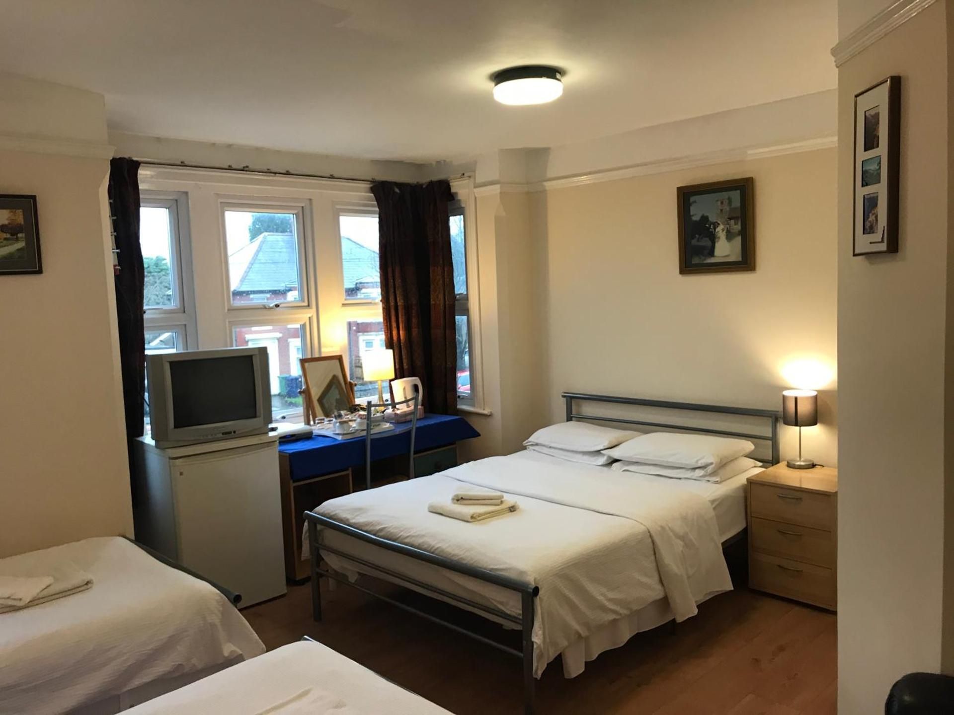 Quadruple Room with Private Bathroom