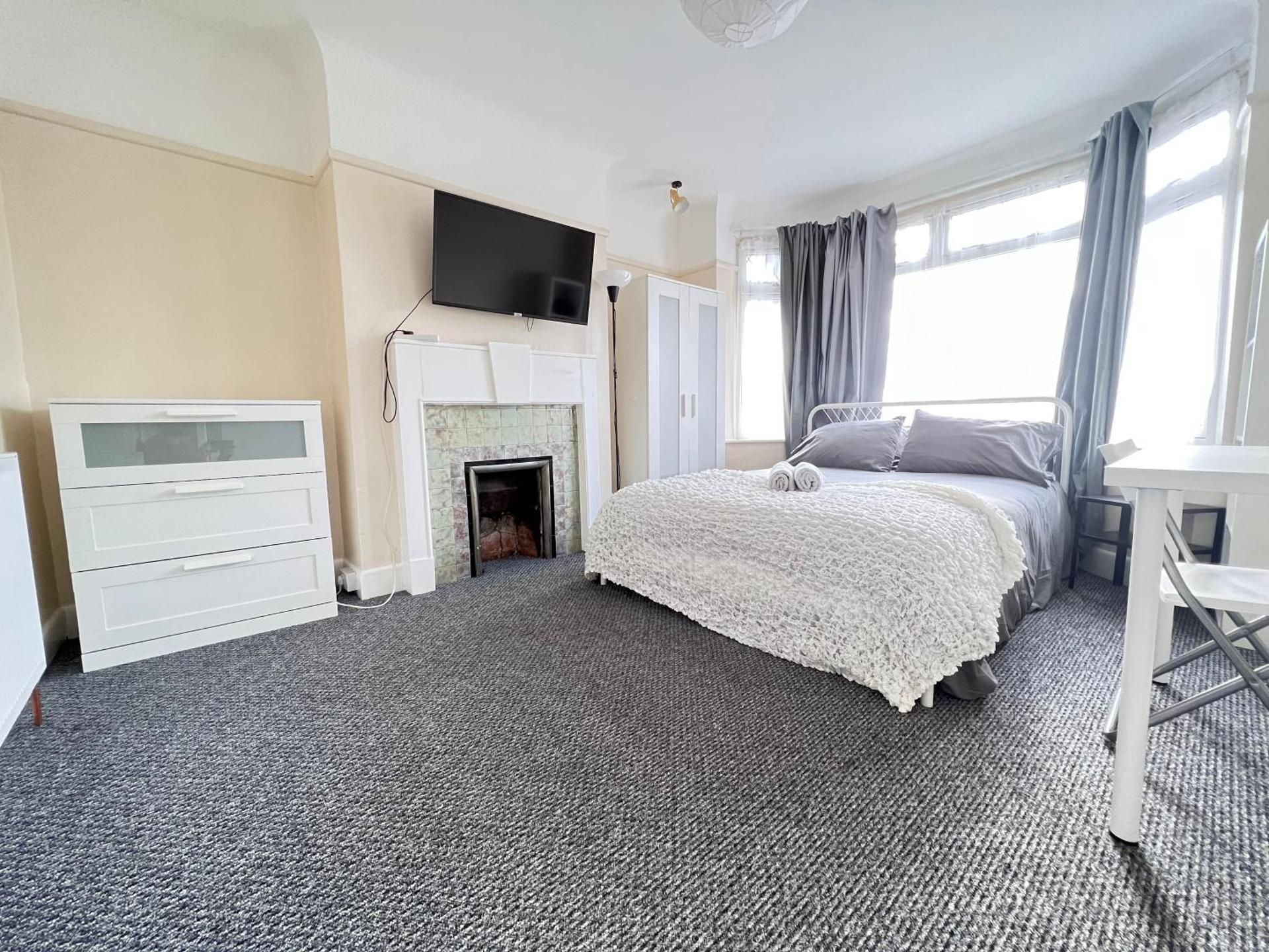 Queen Room with Shared Bathroom