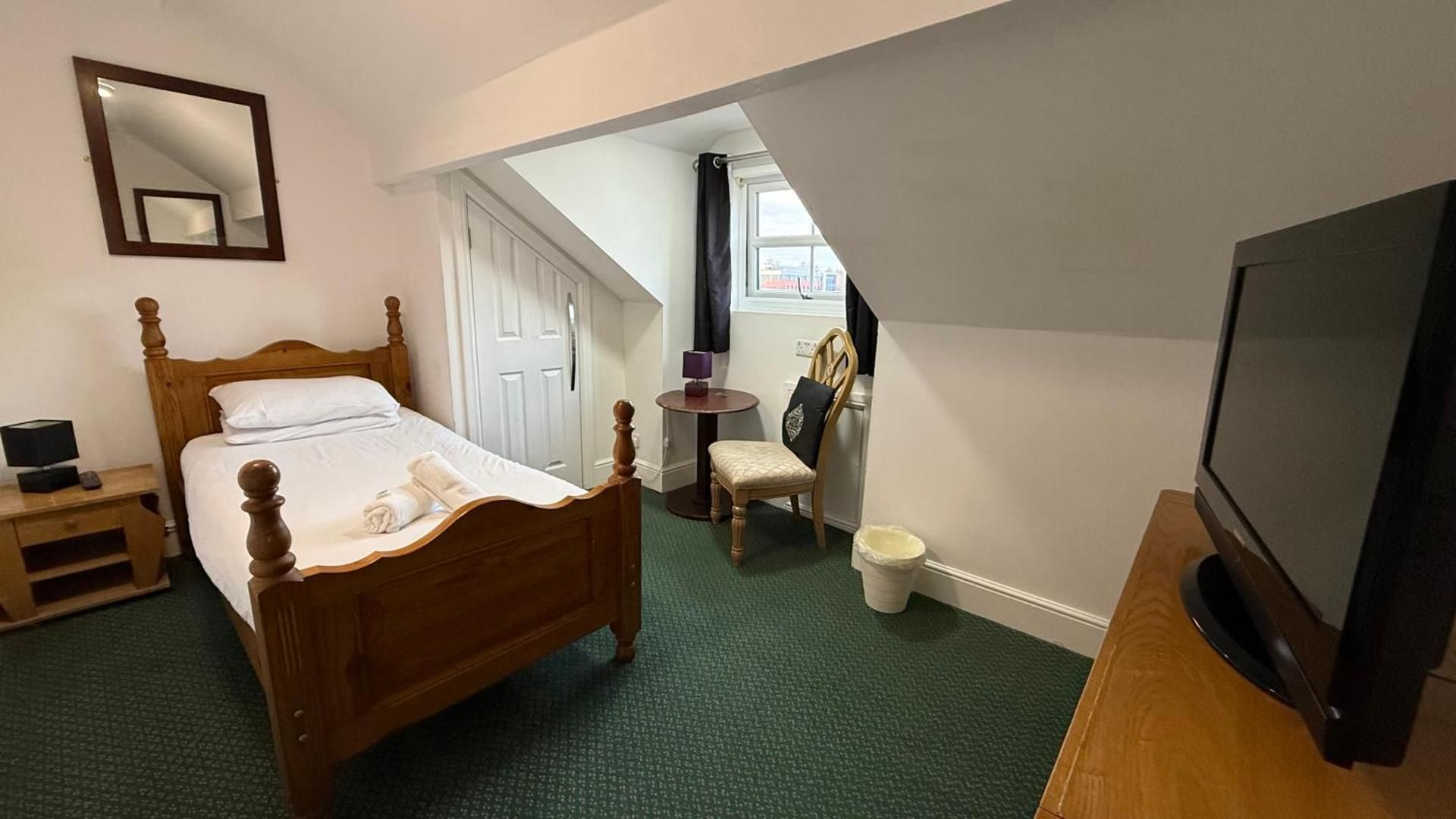 Standard Single with Shared Bathroom