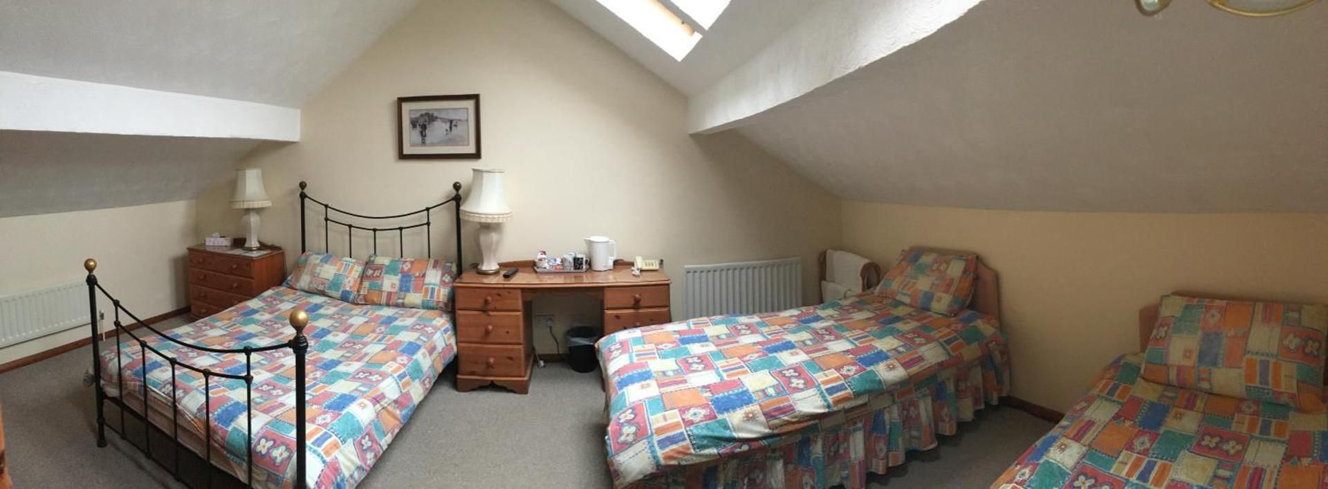 Quadruple Room with Shared Bathroom