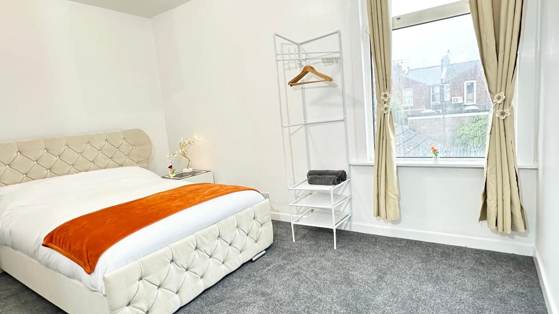 Queen Room with Shared Bathroom