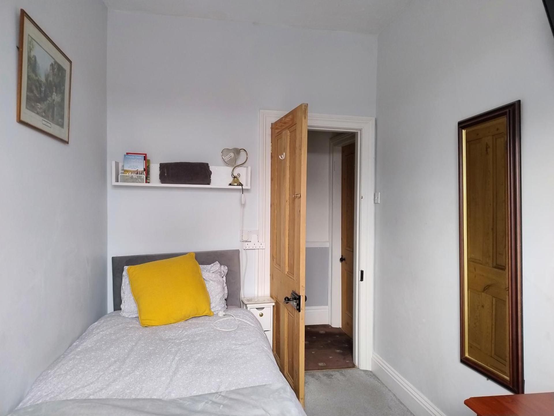 Single Room with Shared Shower and Toilet