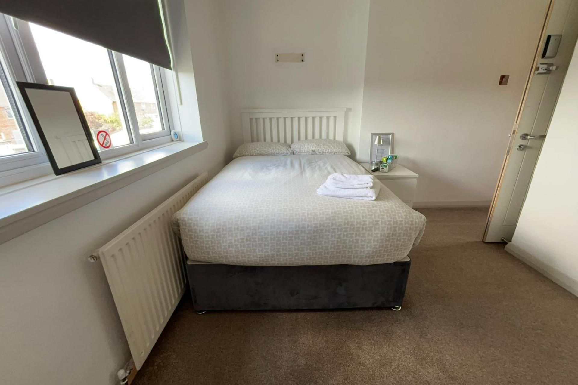 Queen Room with Shared Bathroom