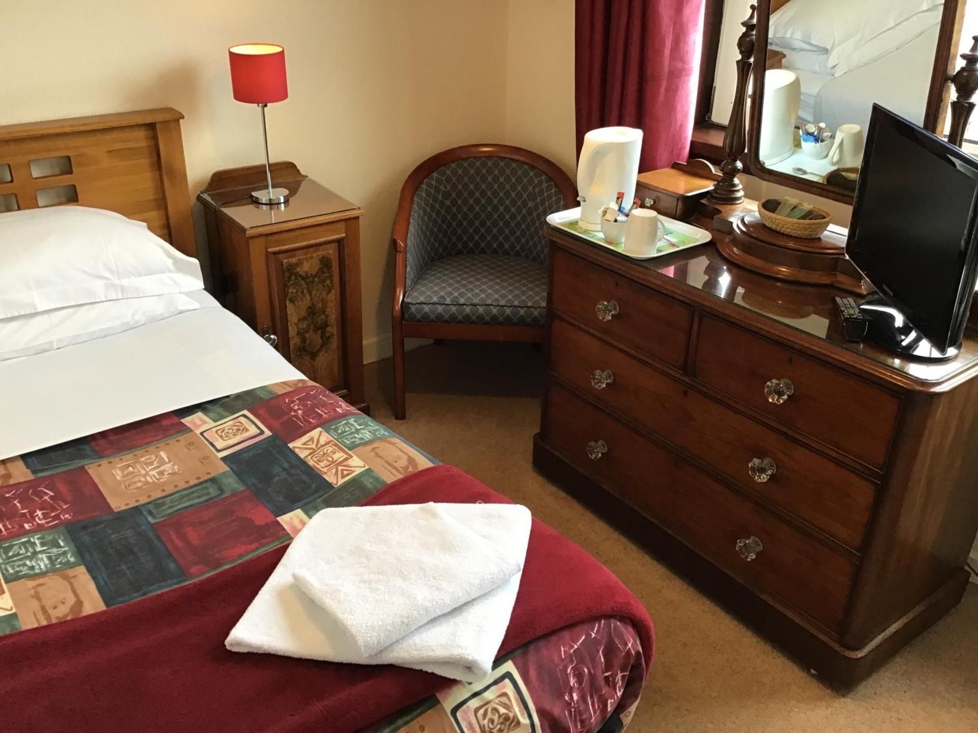 Single Room with Shared Shower and Toilet