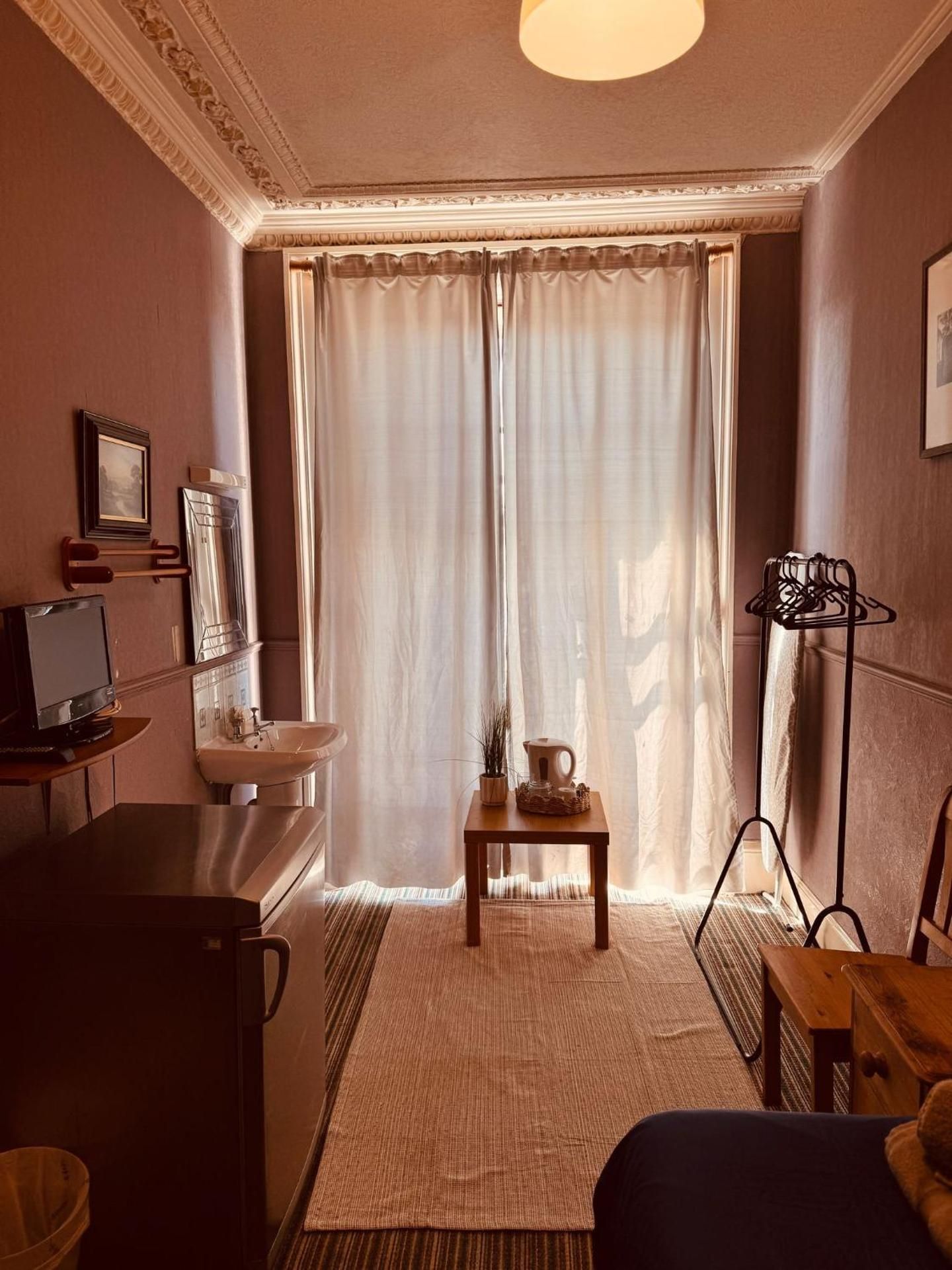 Single Room with Shared Shower and Toilet