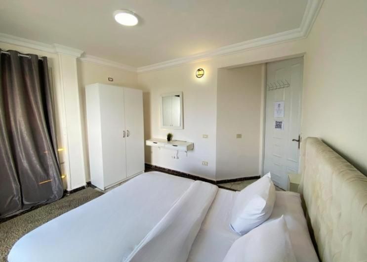Queen Room with Shared Bathroom