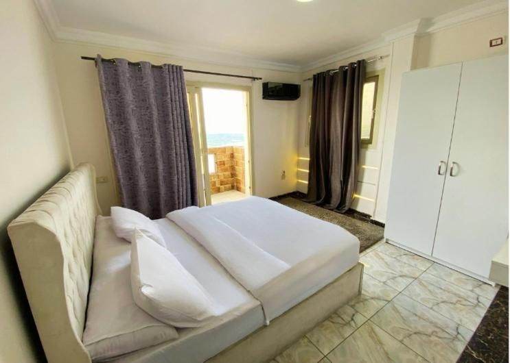 Queen Room with Shared Bathroom