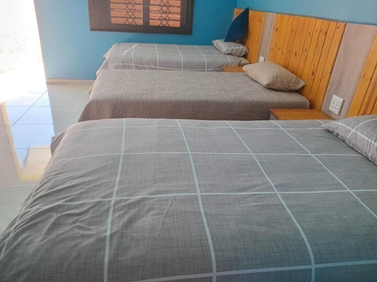 Quadruple Room with Private Bathroom