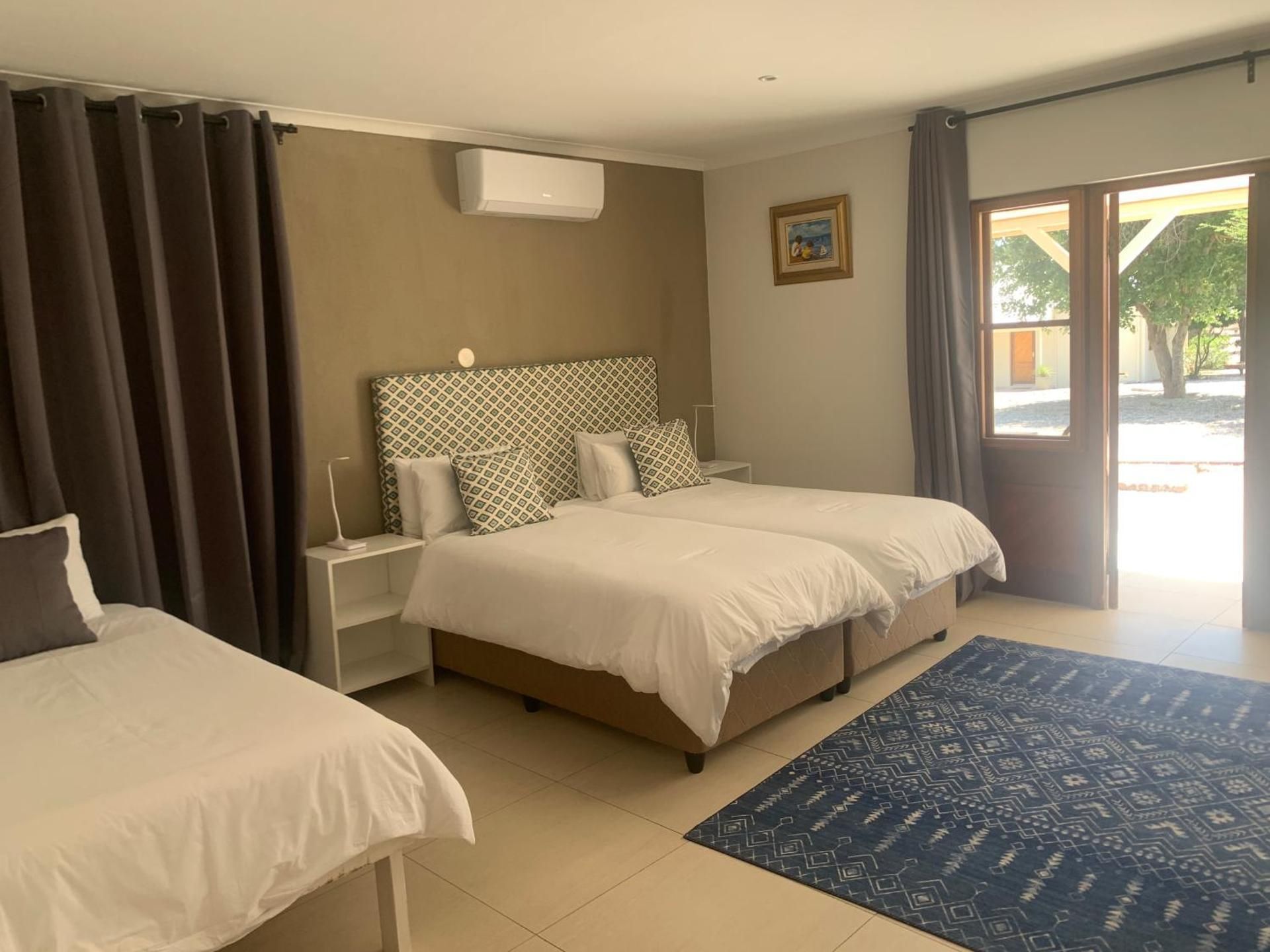 Otjibamba Lodge Family triple room