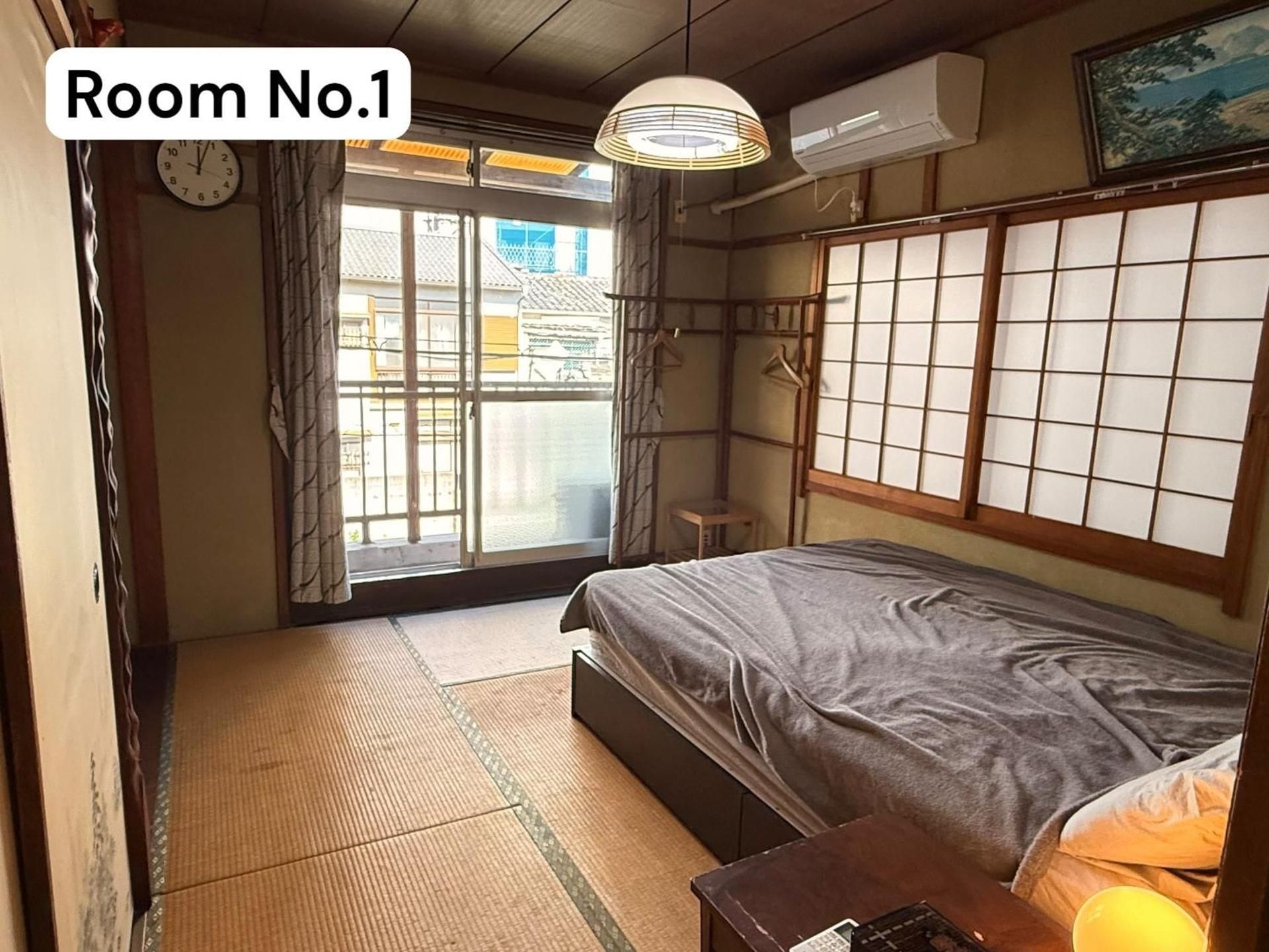 Queen Room with Shared Bathroom