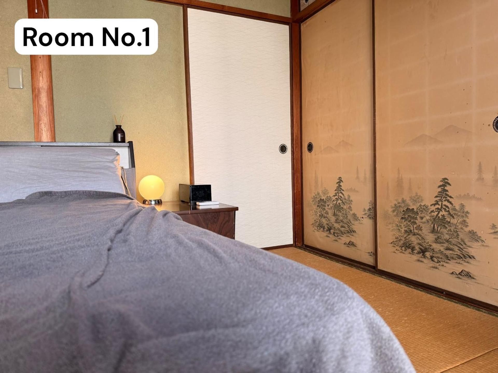 Queen Room with Shared Bathroom