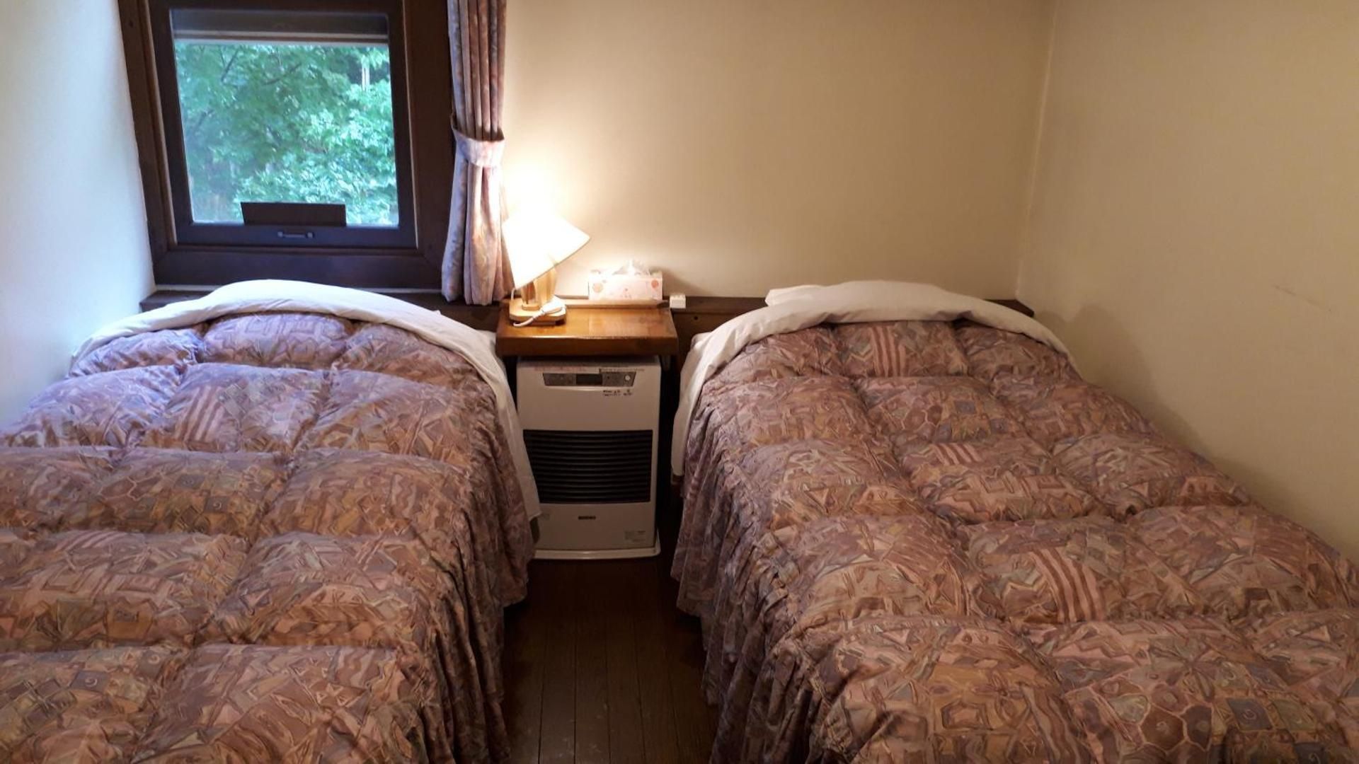 Standard Twin Room with Shared Shower & Toilet - Non-Smoking