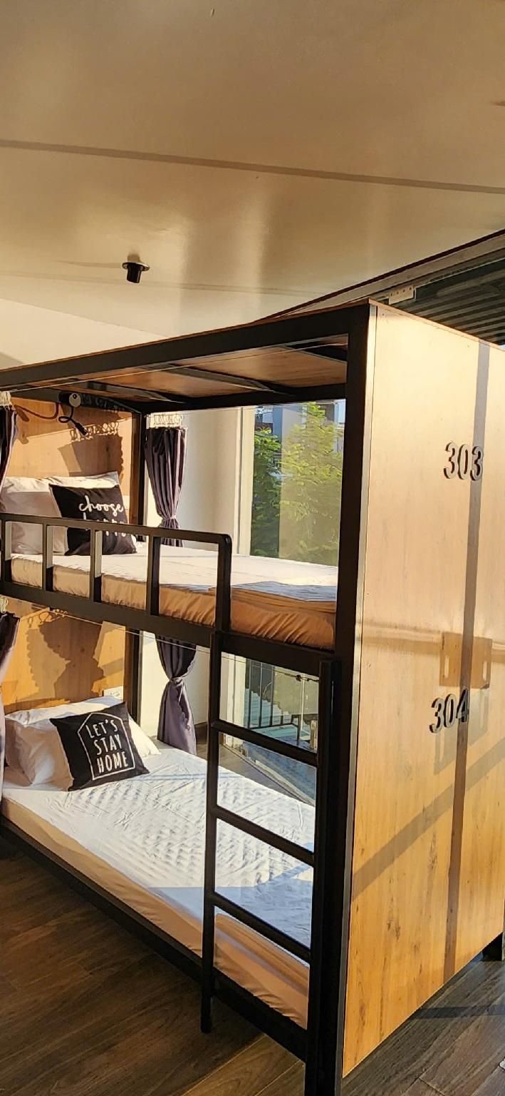 Bed in 4 Bed Mixed AC Dormitory Room with Shared Bathroom