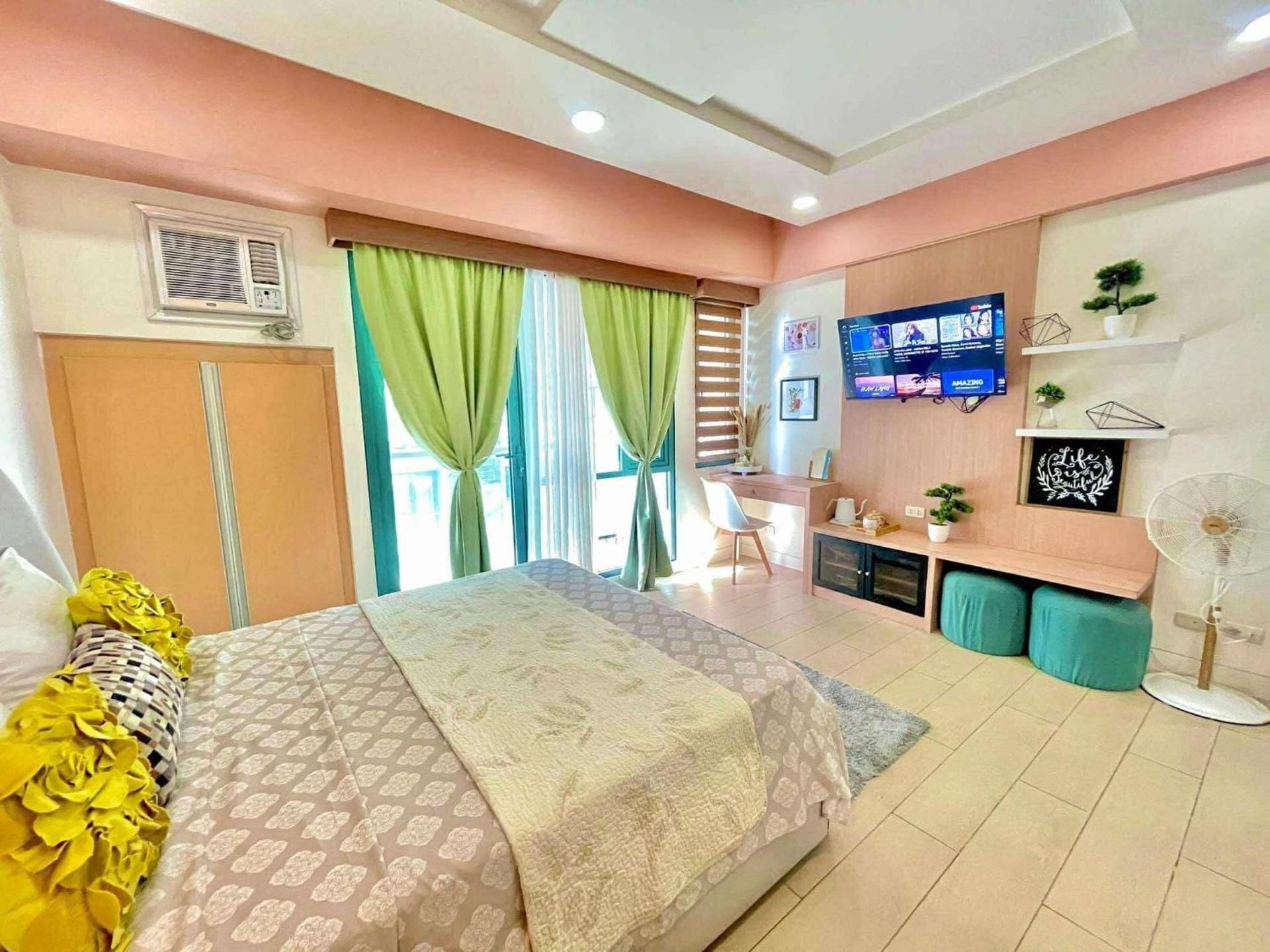 One-Bedroom Apartment with Balcony and City View
