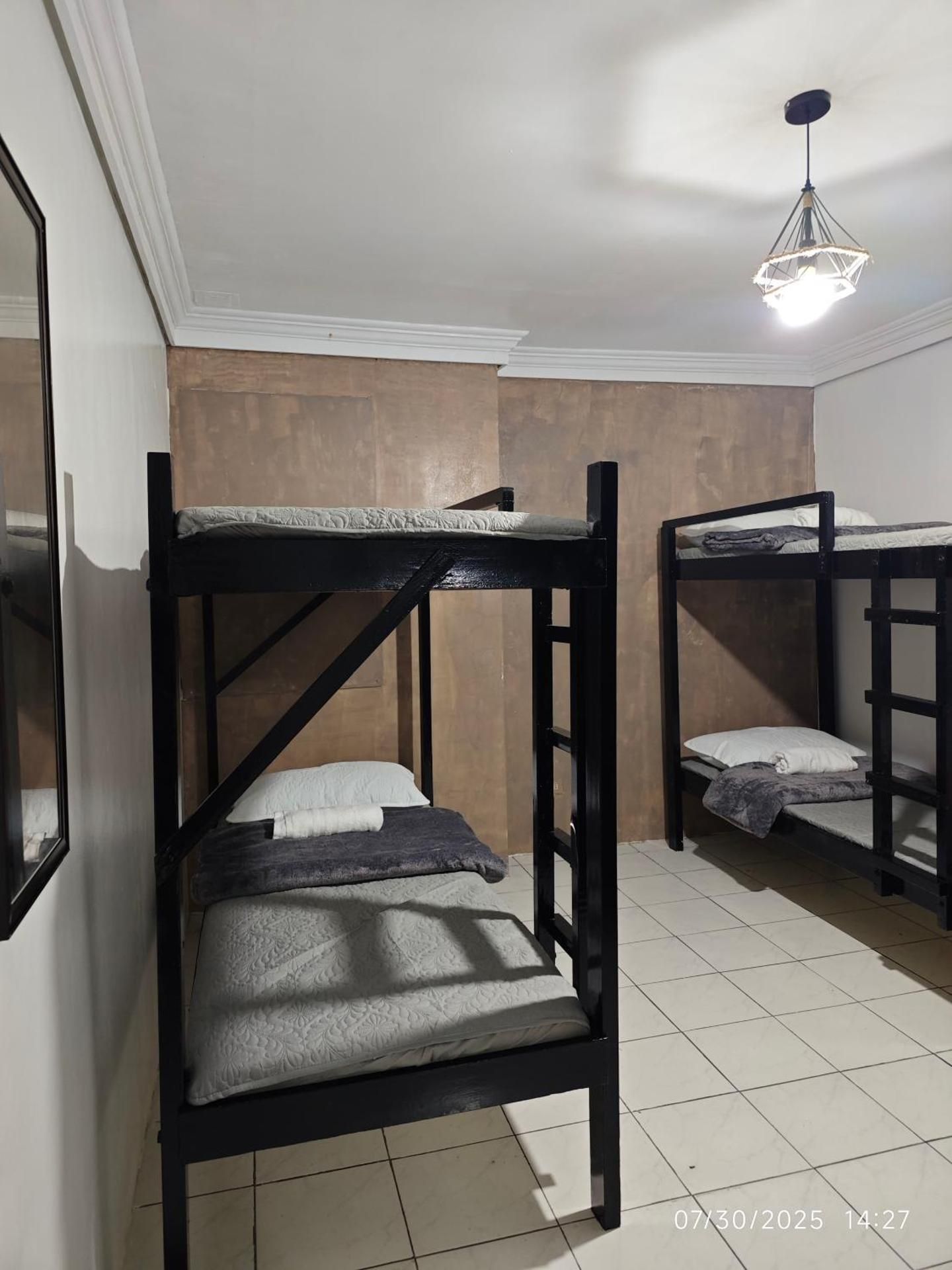 Economy Quadruple Room with Shared Bathroom