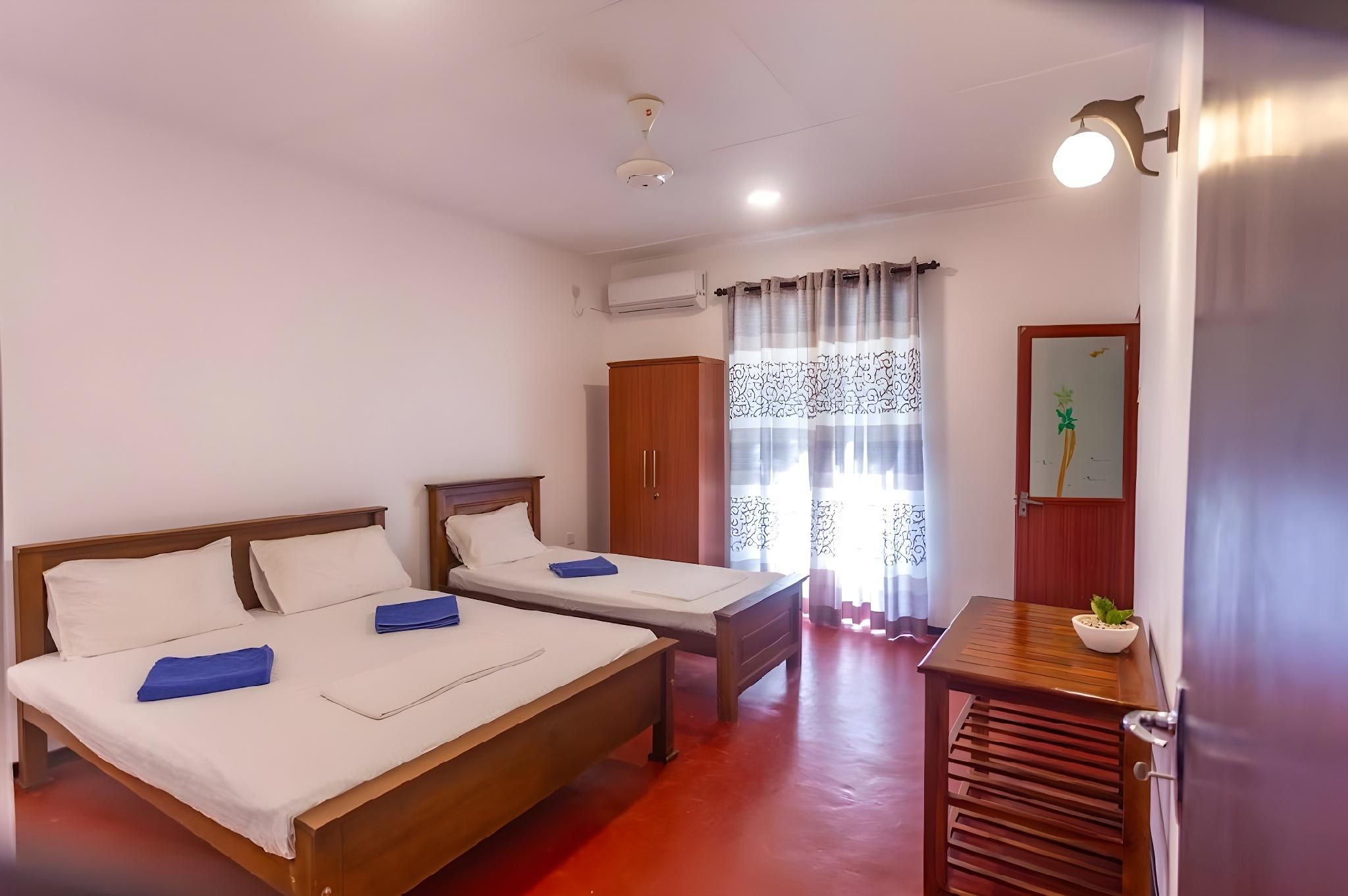 Aurelle Villa Triple Room - 1 Double Bed and 1 Single Bed