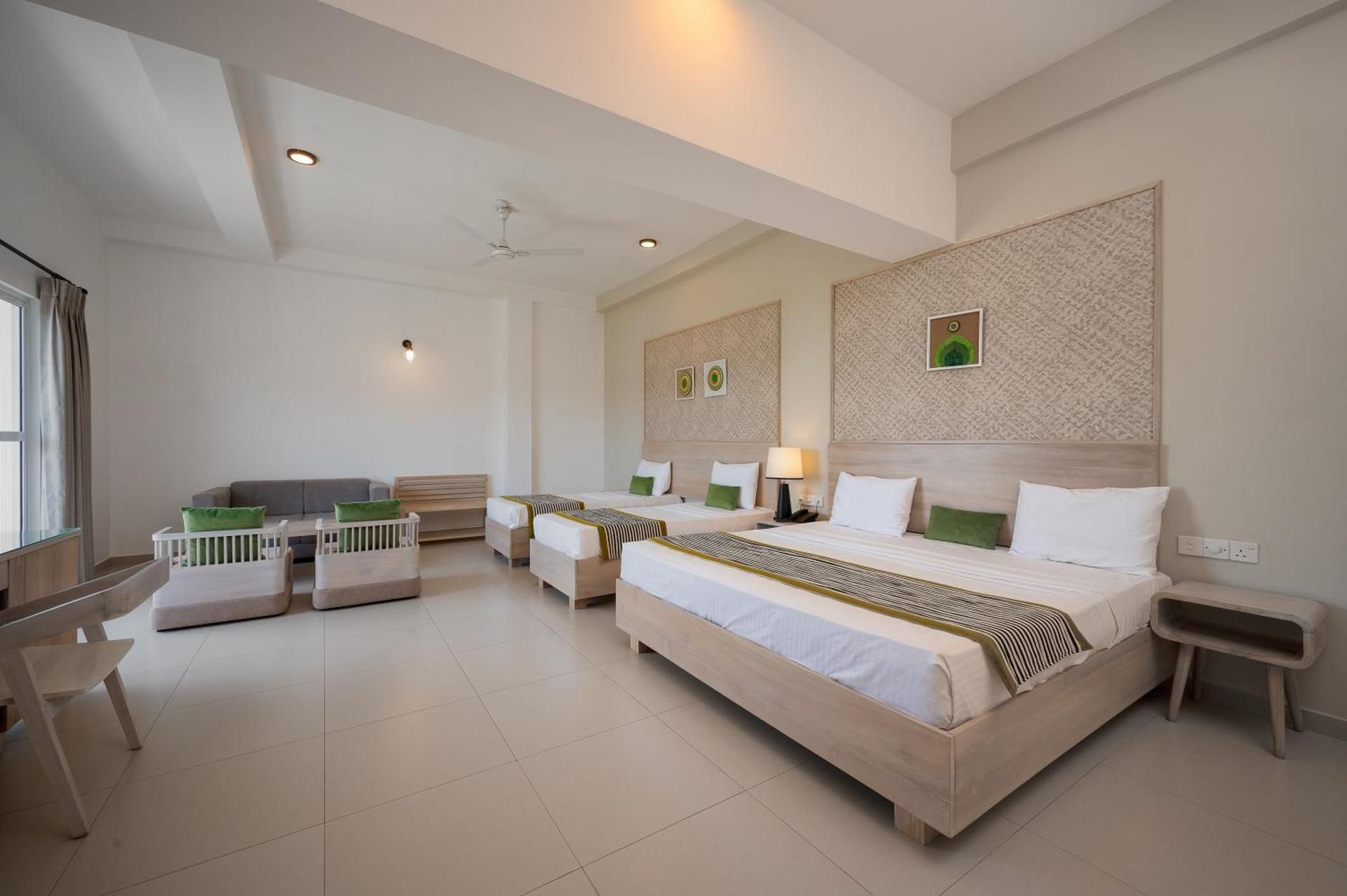 Hotel Oviya Family Suite with Balcony