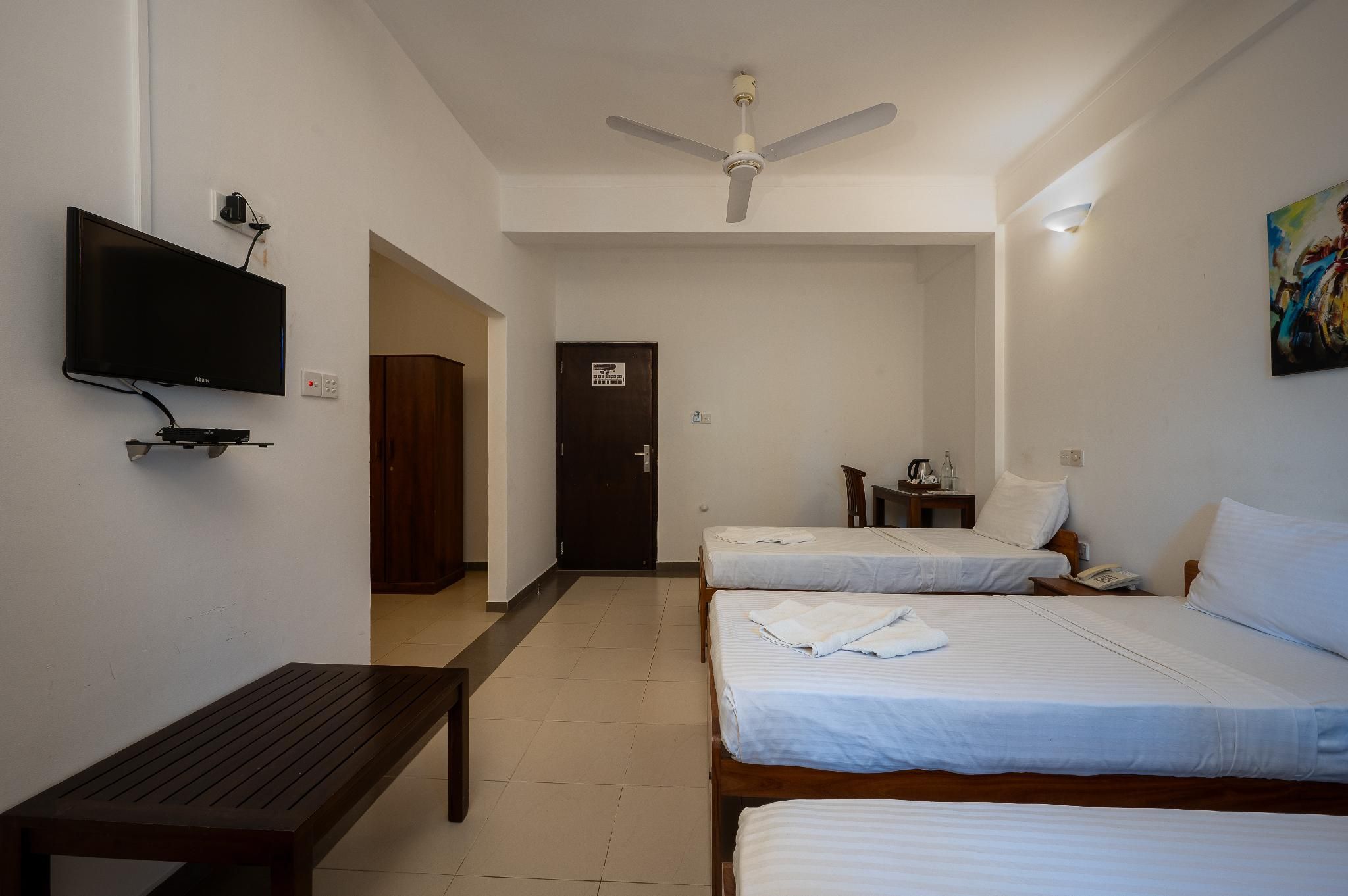 Hotel Oviya Comfort Triple Room 3