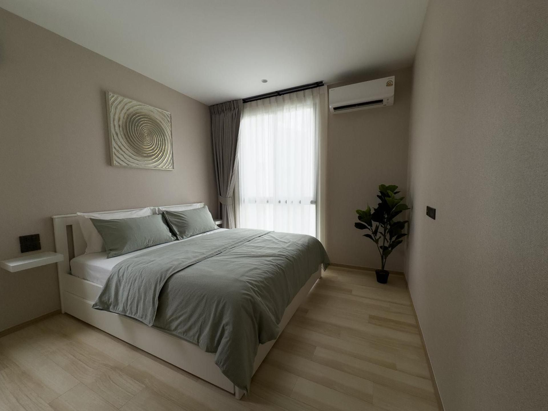 Title Halo by EIE ASSIA One-Bedroom Apartment