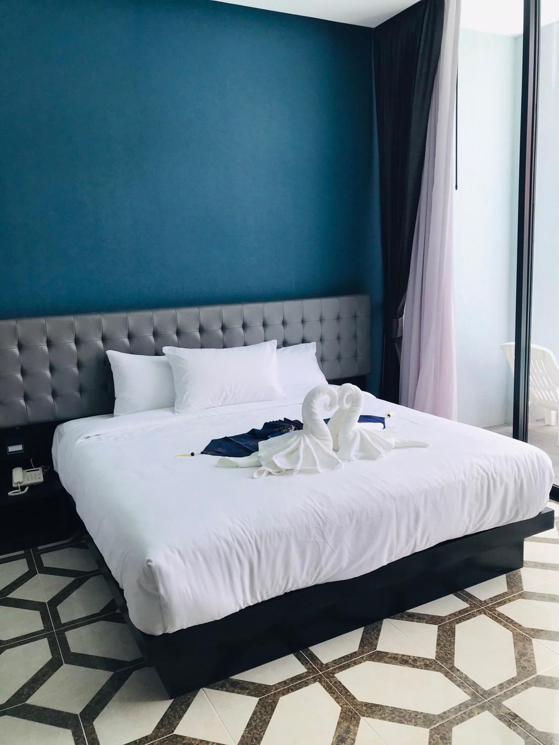 Deluxe Pool or City View King Room with Balcony