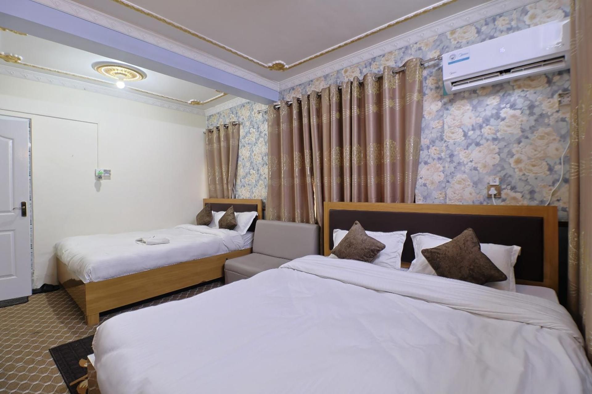 Deluxe Triple Room