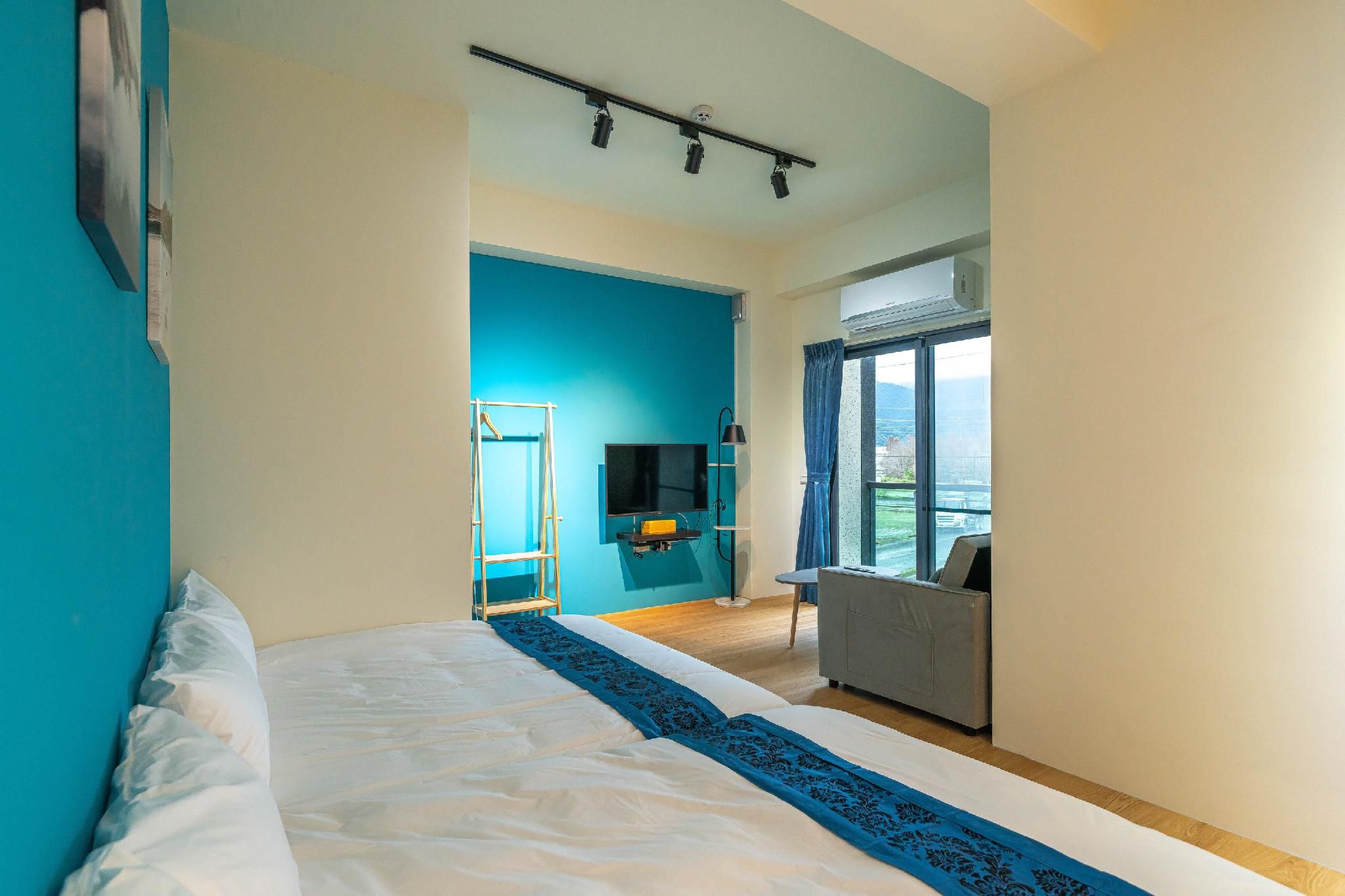 Deluxe Quadruple Room with Balcony