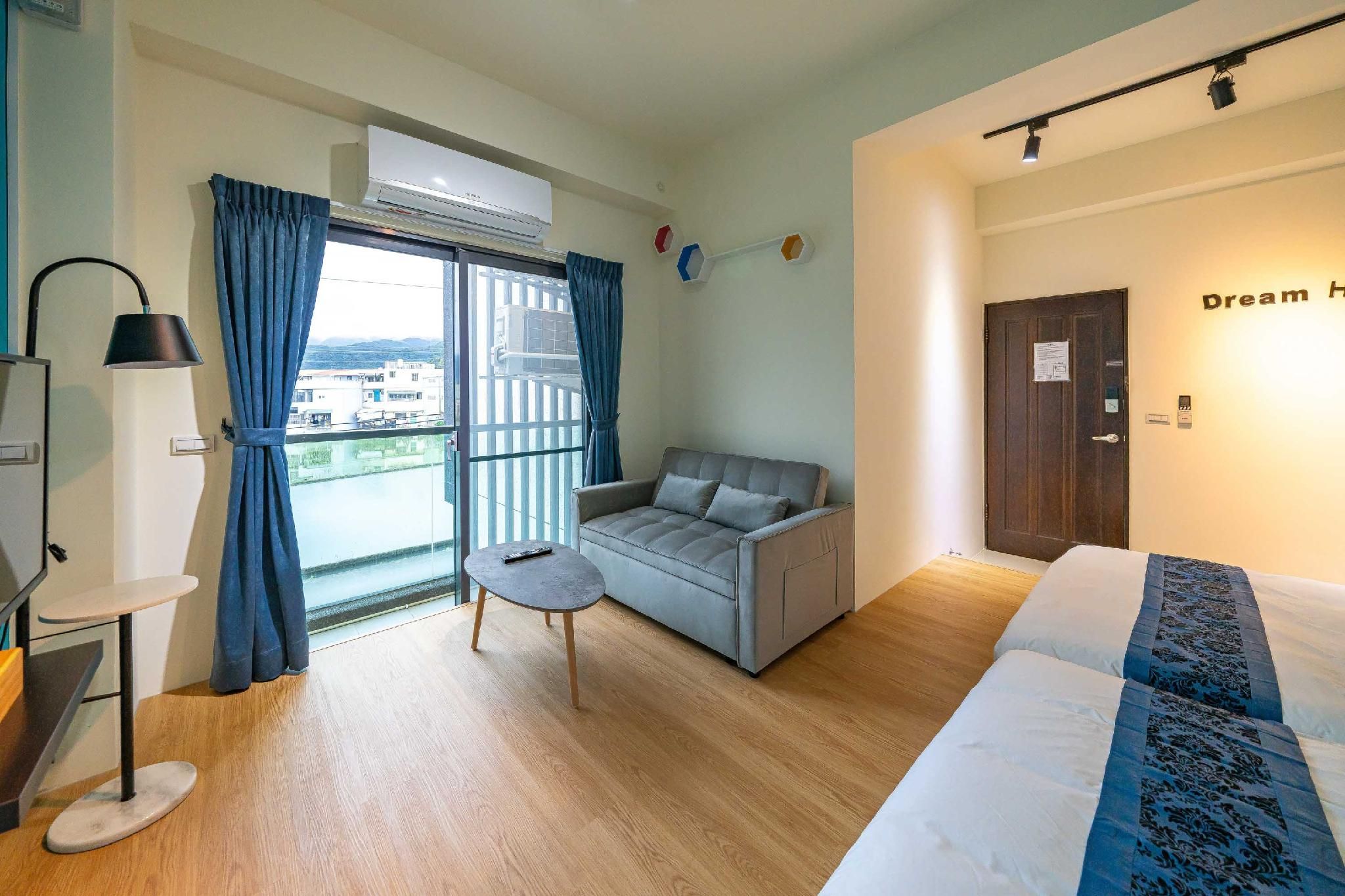 Deluxe Quadruple Room with Balcony
