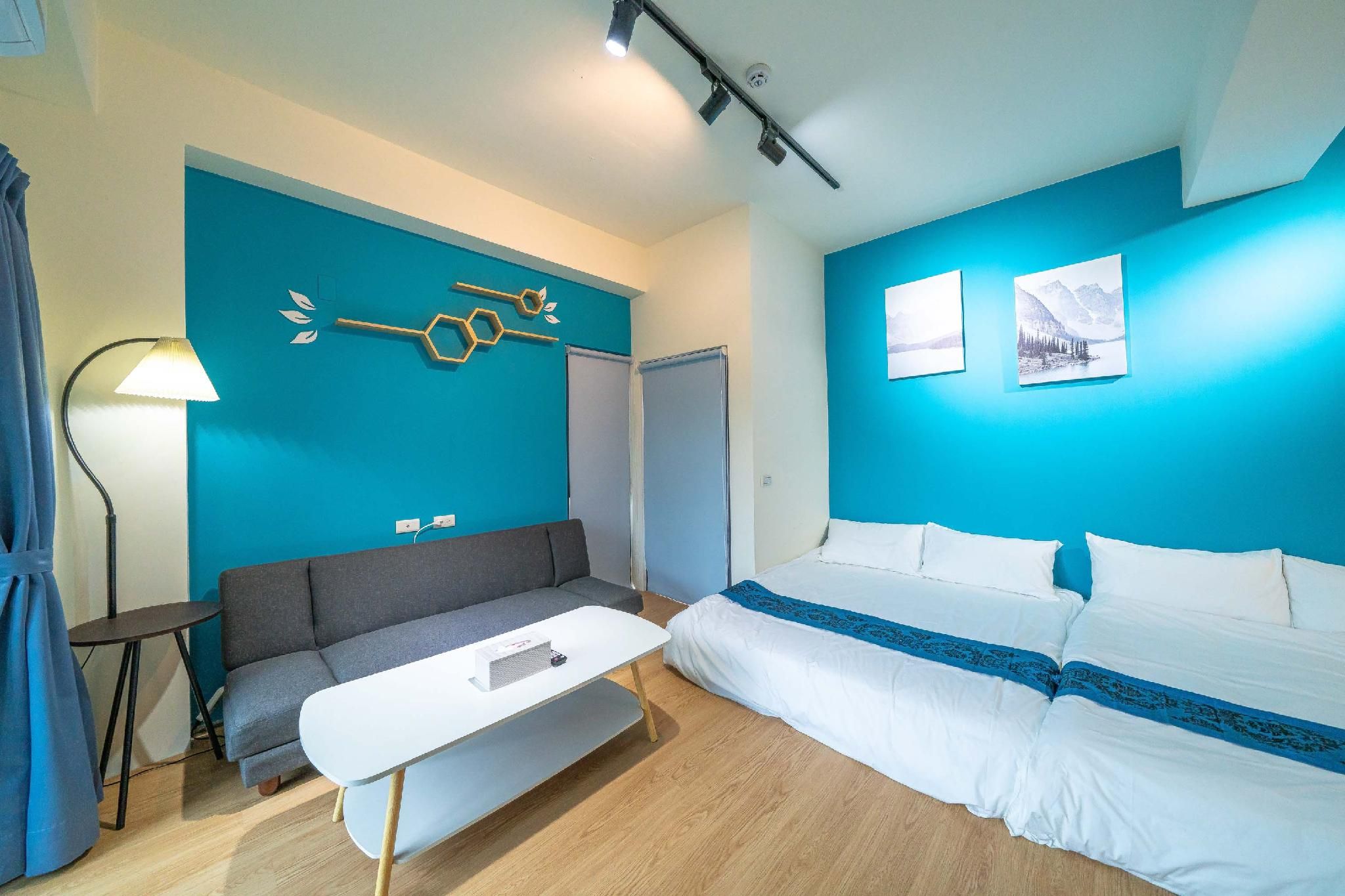 Deluxe Quadruple Room with Balcony