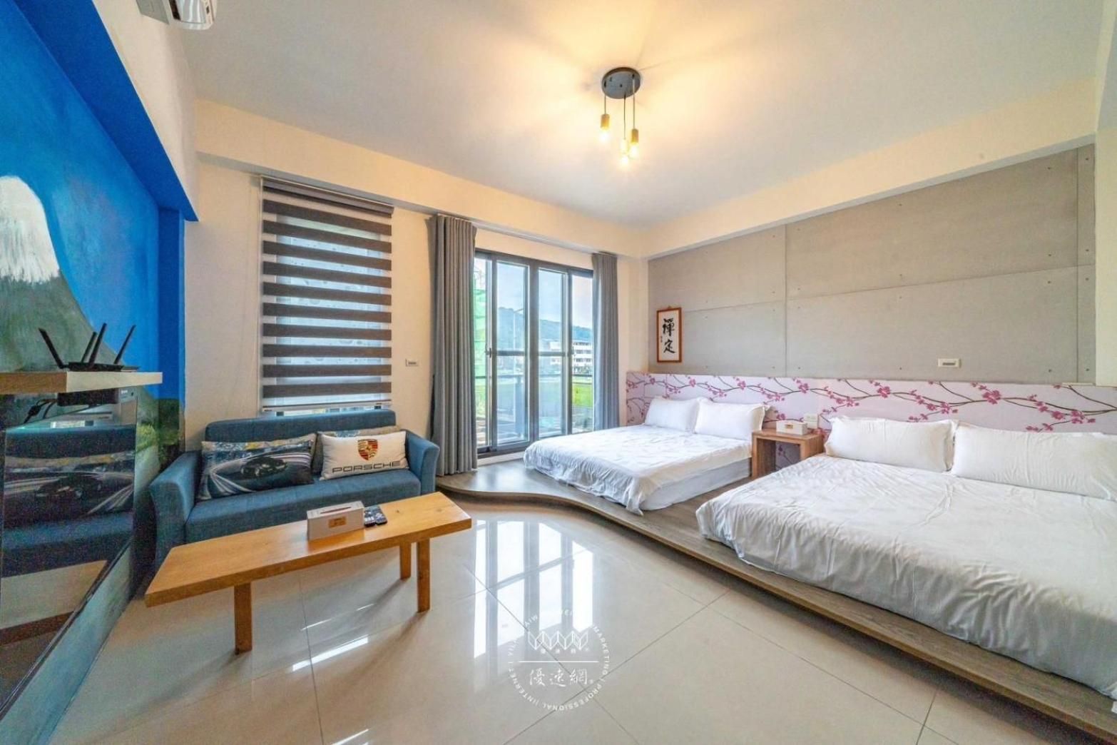 Deluxe Quadruple Room with Balcony
