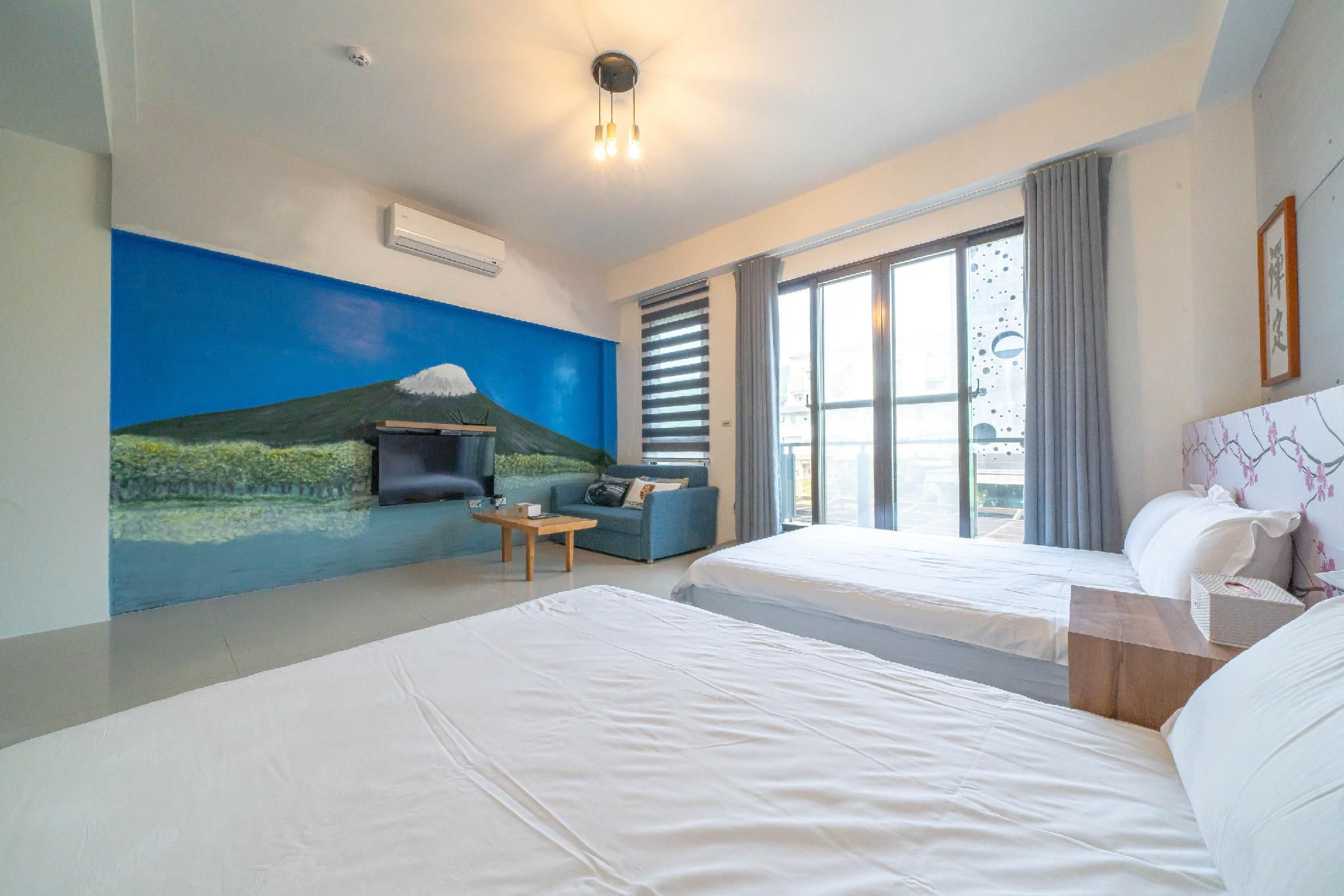 Deluxe Quadruple Room with Balcony