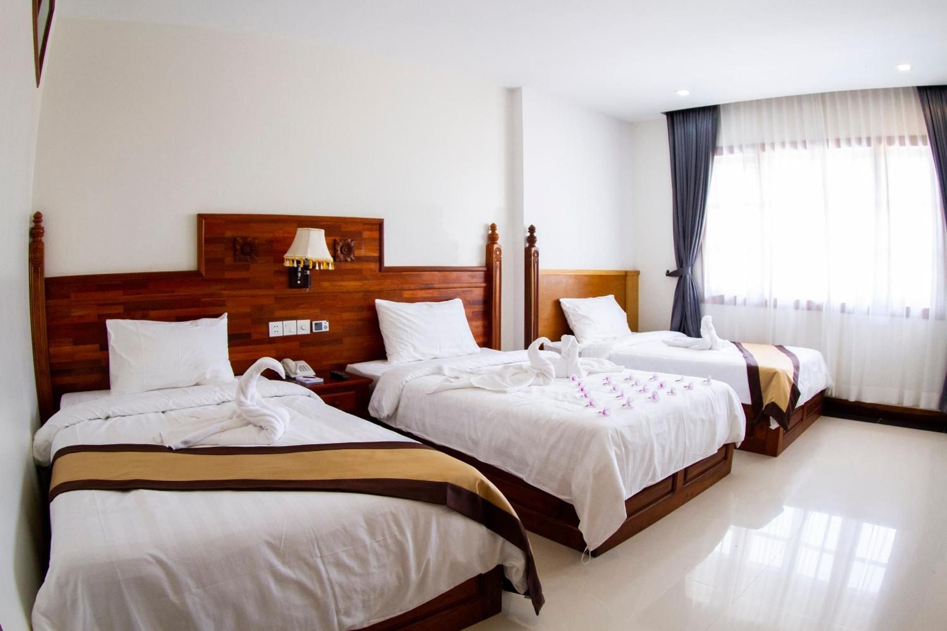 Deluxe Triple Room