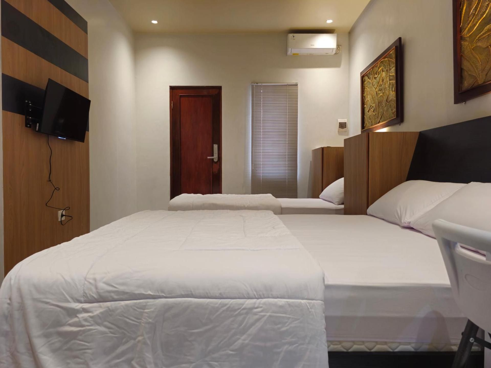 Deluxe Triple Room