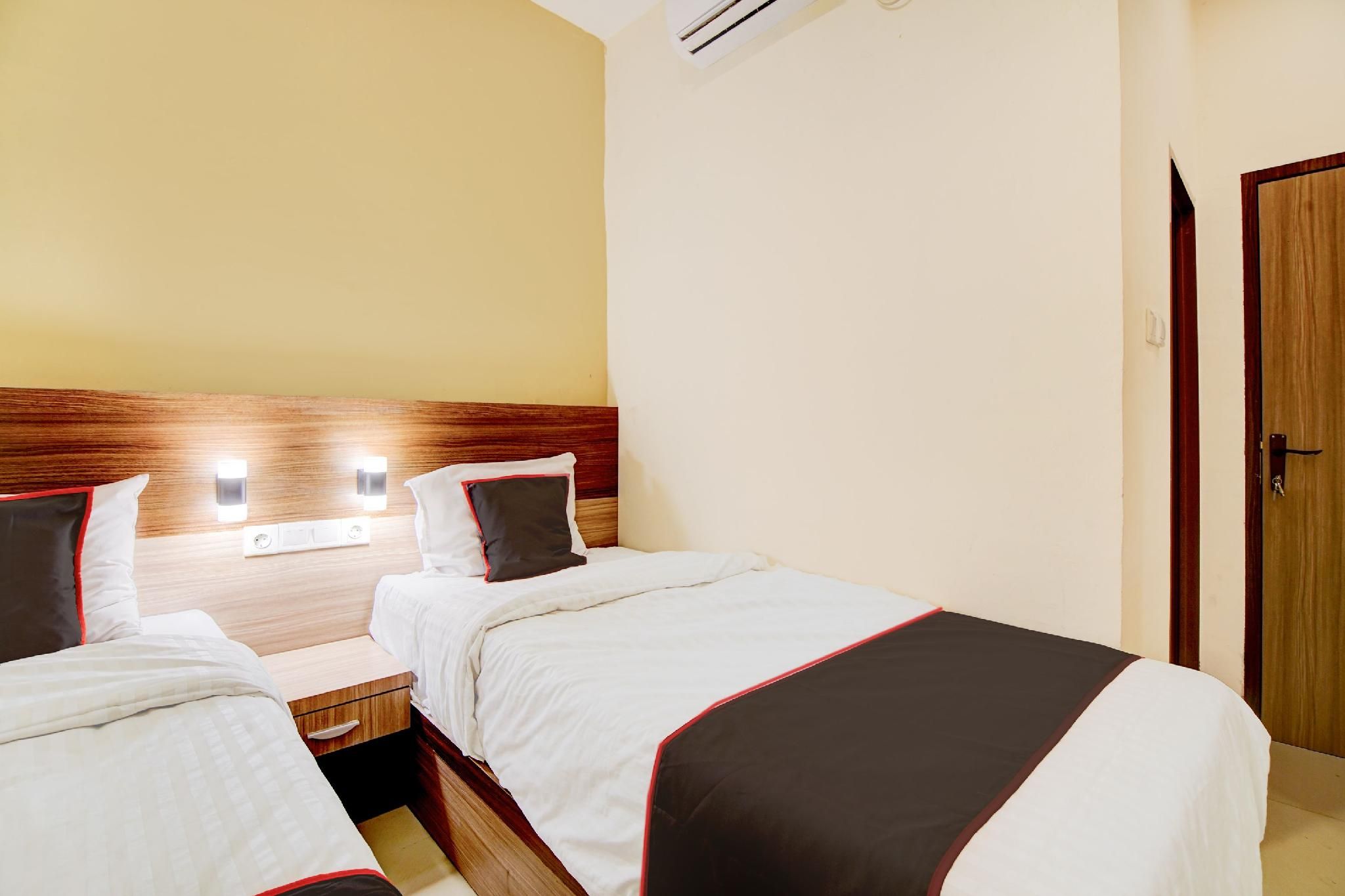 Check My Guest Radja Homestay Deluxe Twin 2