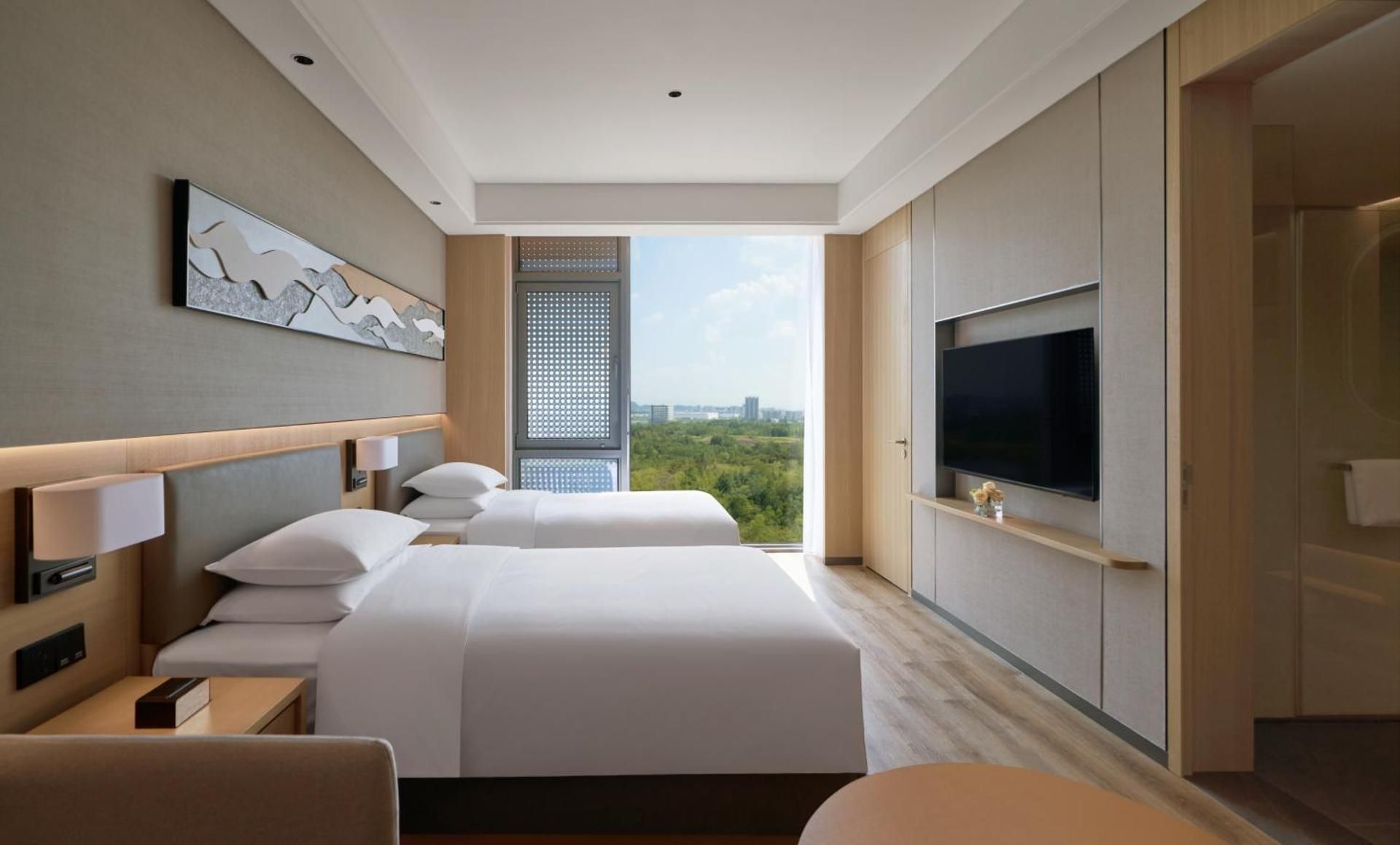 Two Twin Beds (with Sofa Bed)