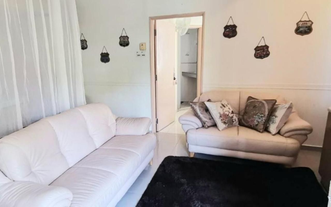 Three-Bedroom Apartment with Balcony